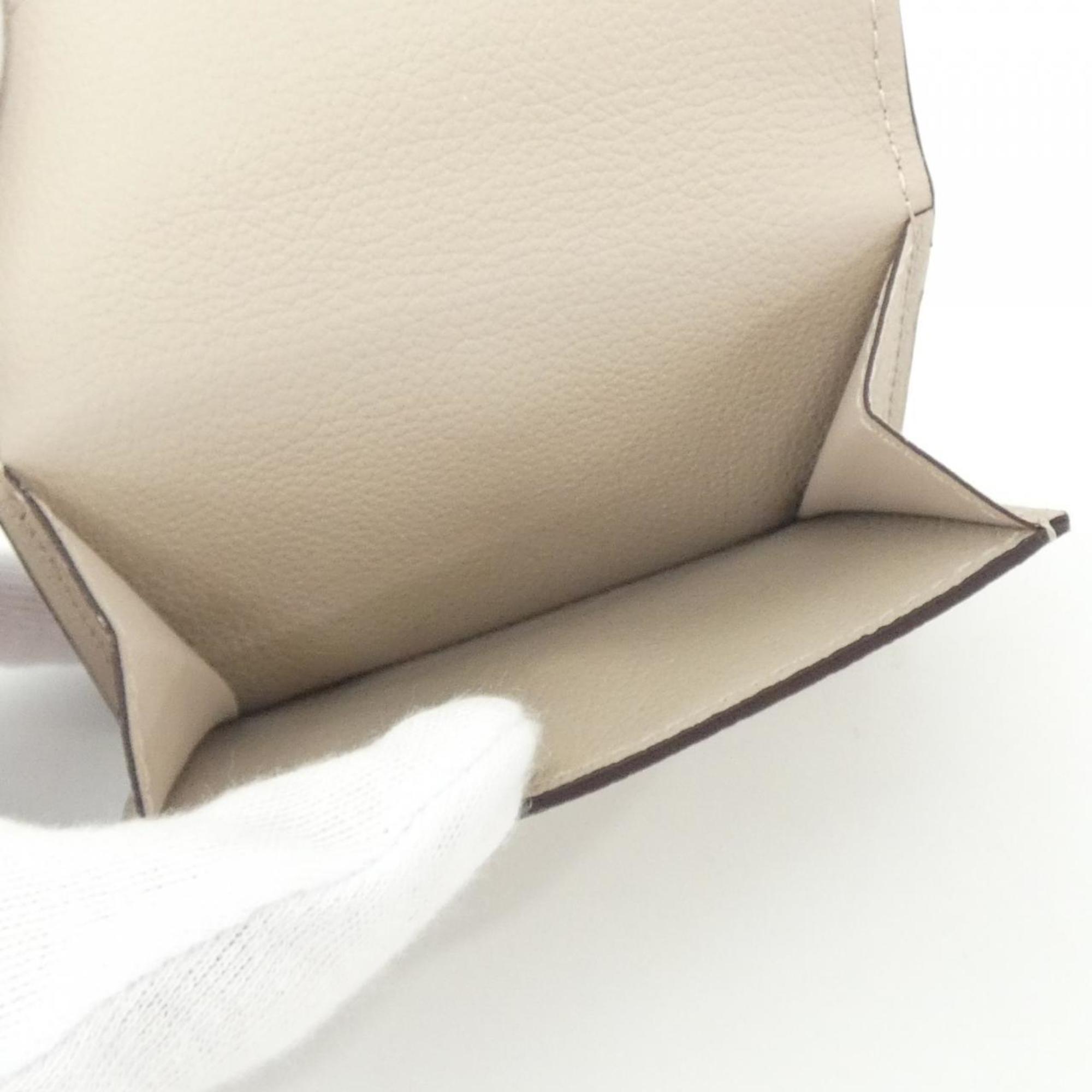 Louis Vuitton Grayish Leather Wallet (Tri-Fold)