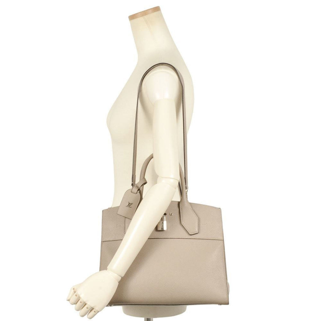 Louis Vuitton Beige Leather Handbag