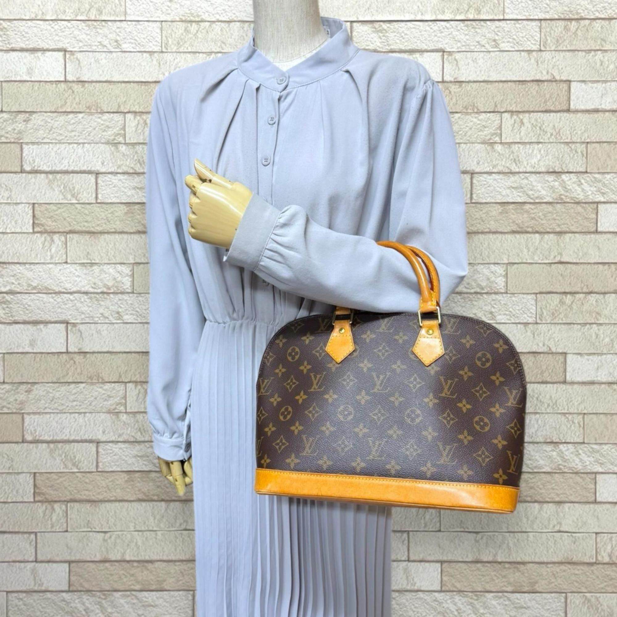 Louis Vuitton Brown Monogram Canvas Handbag