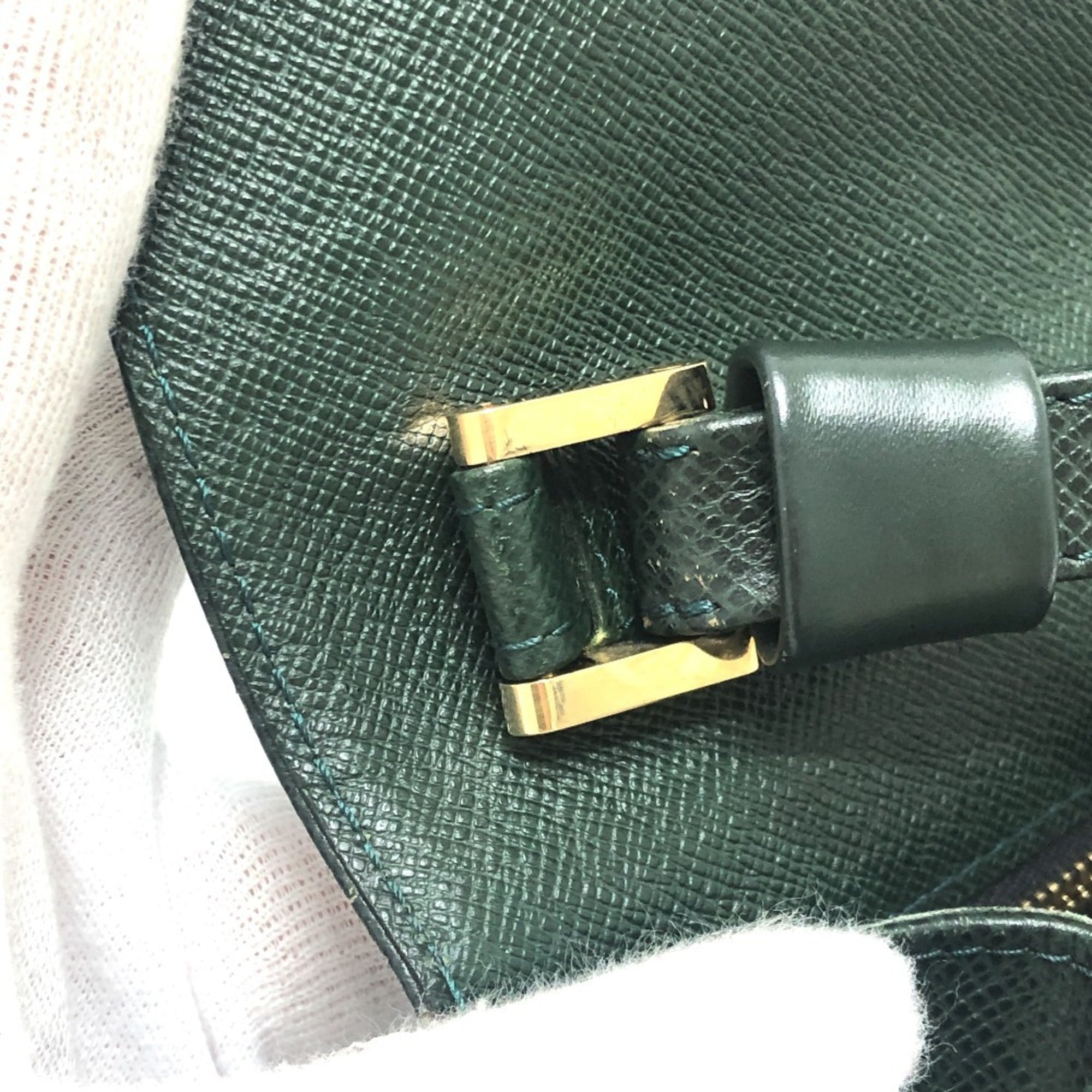 Louis Vuitton Episea Leather Taiga Leather Clutch Bag