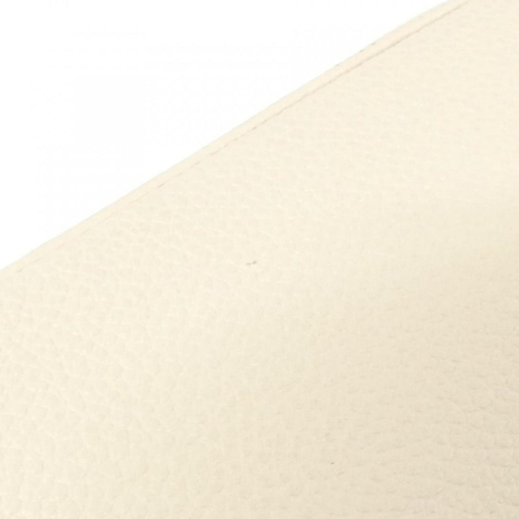 Louis Vuitton Monogram Empreinte Gold Leather Handbag