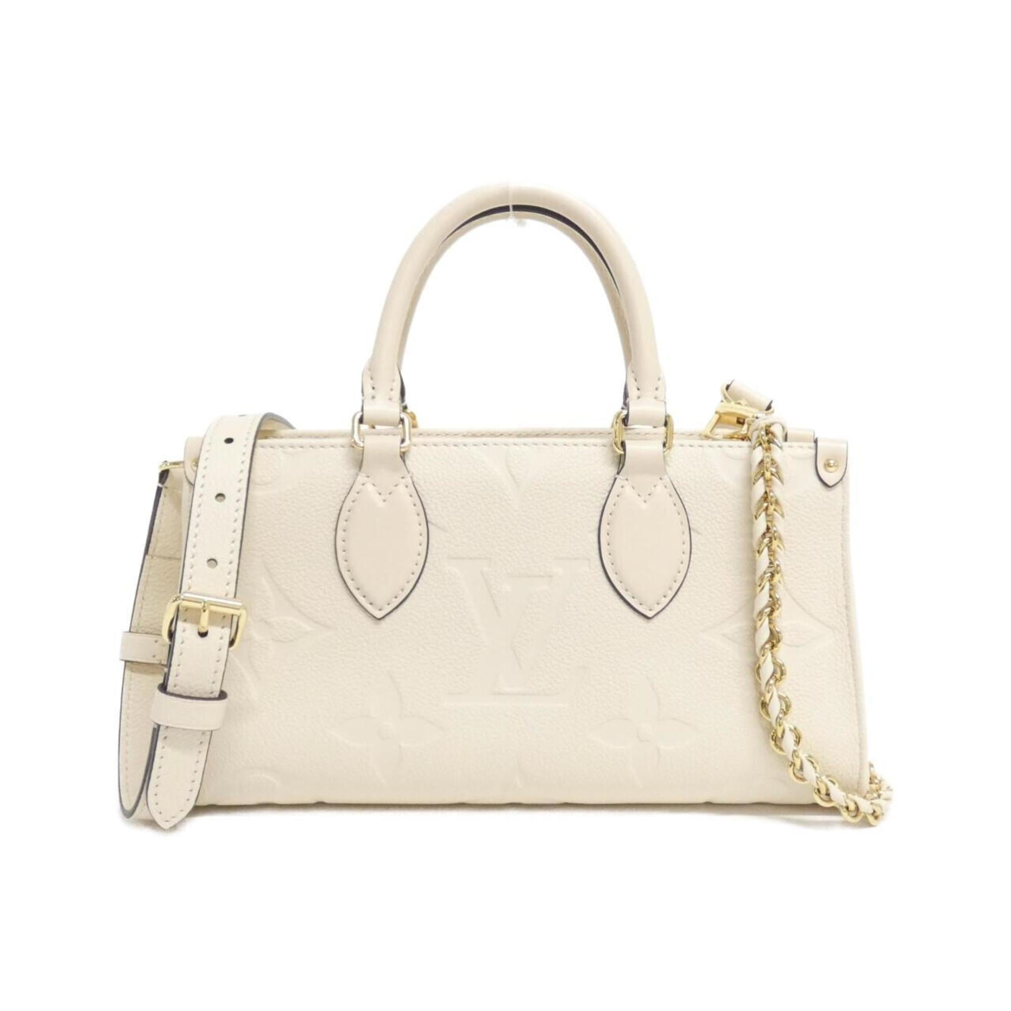 Louis Vuitton Monogram Empreinte Gold Leather Handbag