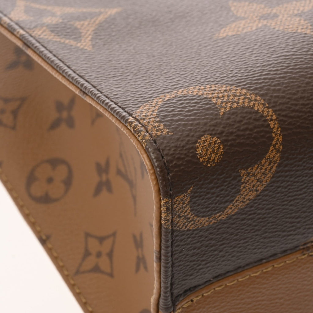Louis Vuitton Brown Monogram Handbag Pouch