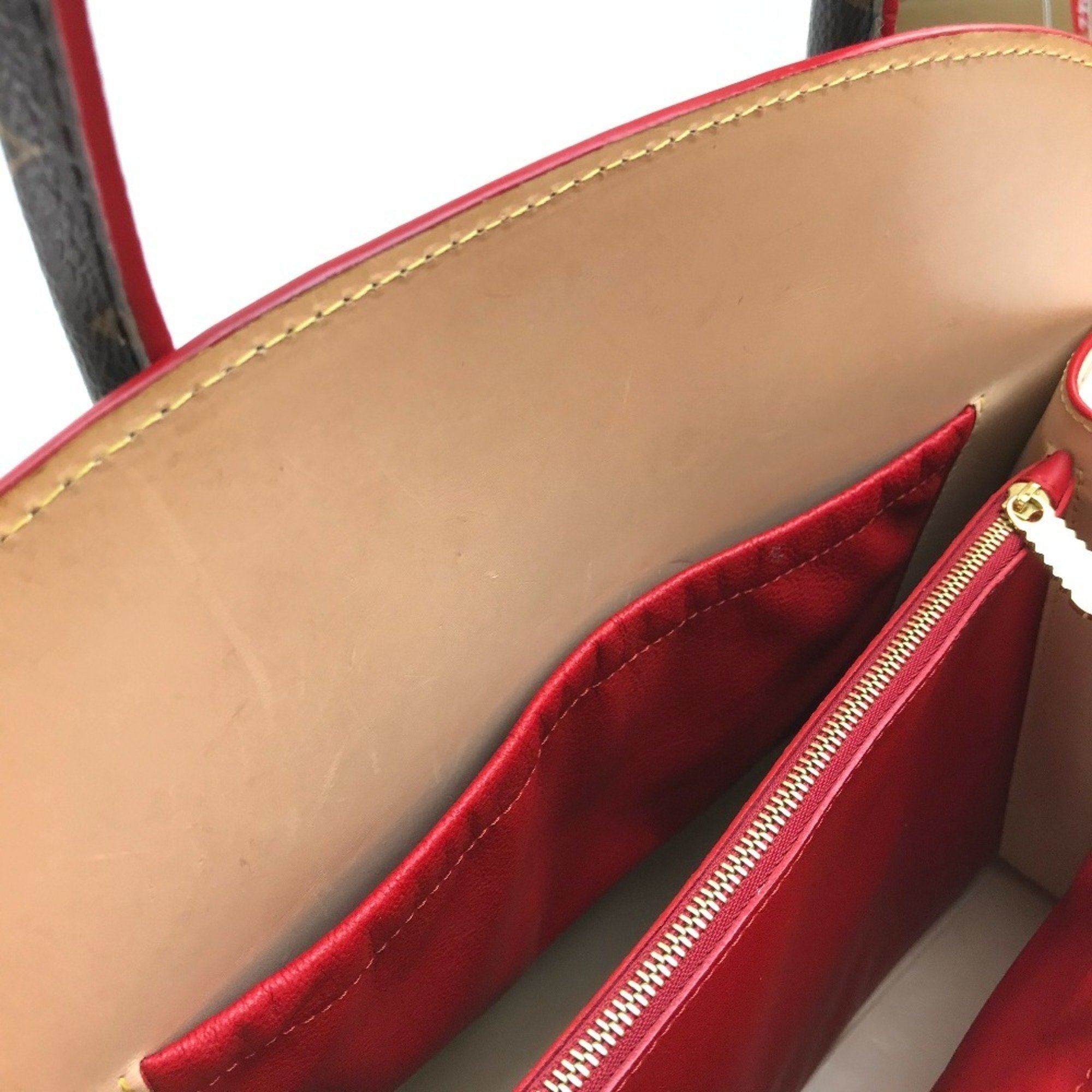 Louis Vuitton Brown Monogram Red Color Monogram Leather Handbag