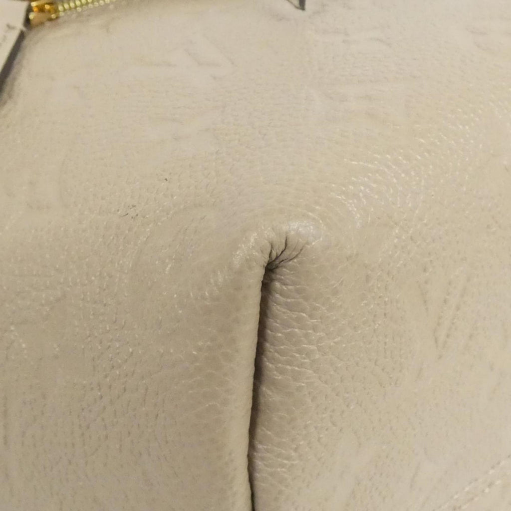 Louis Vuitton Monogram Empreinte Tourterelle Leather Backpack