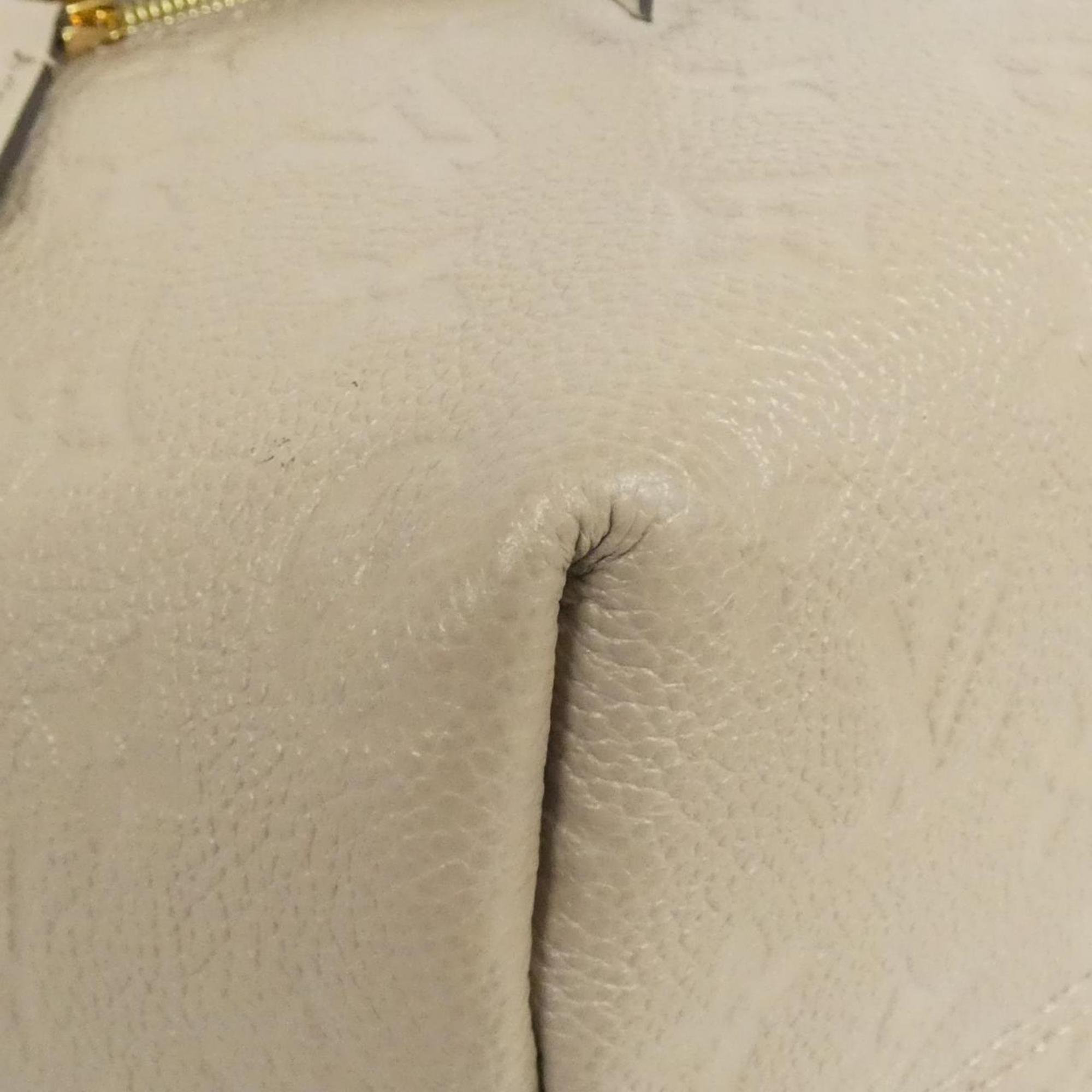 Louis Vuitton Monogram Empreinte Tourterelle Leather Backpack