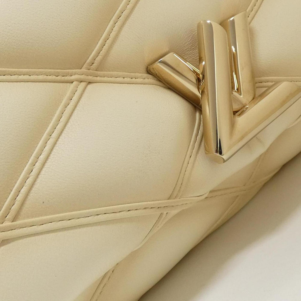 Louis Vuitton Gold Leather Handbag