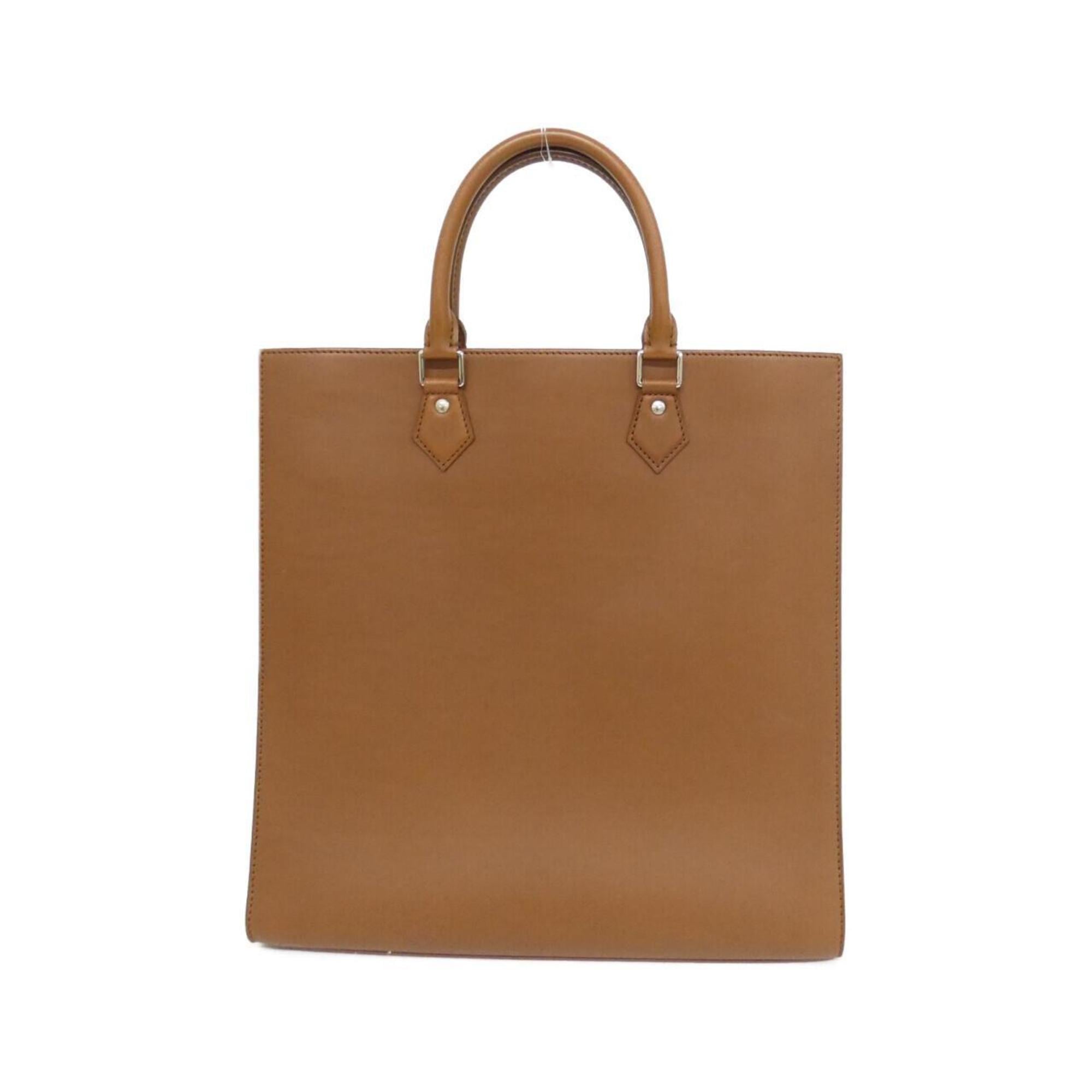 Louis Vuitton Nomad Silver Leather Handbag