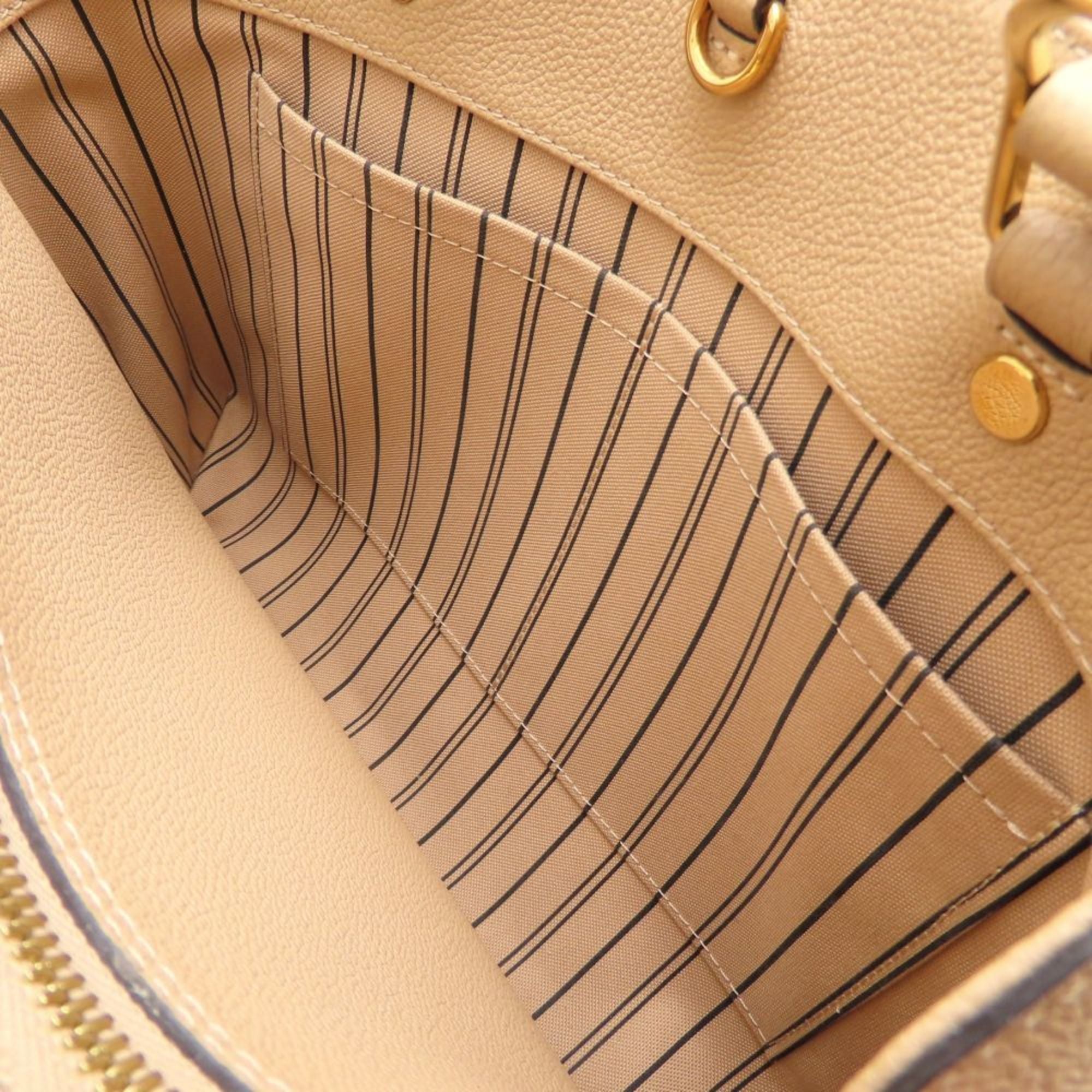 Louis Vuitton Dune Leather Handbag