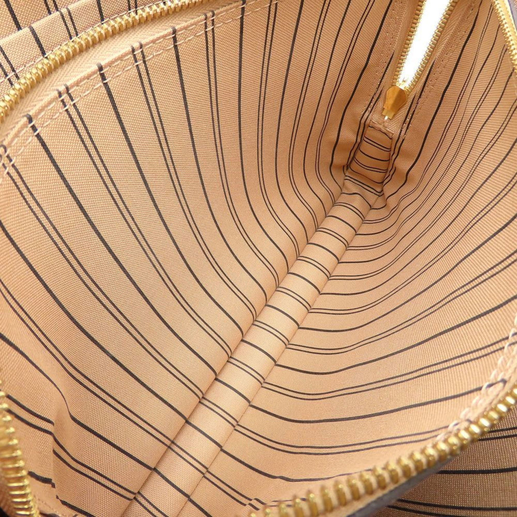 Louis Vuitton Dune Leather Handbag