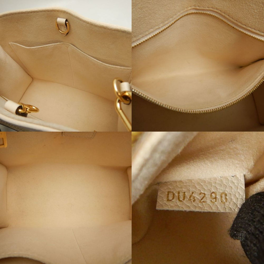 Louis Vuitton Cream Monogram Empreinte Tote Bag