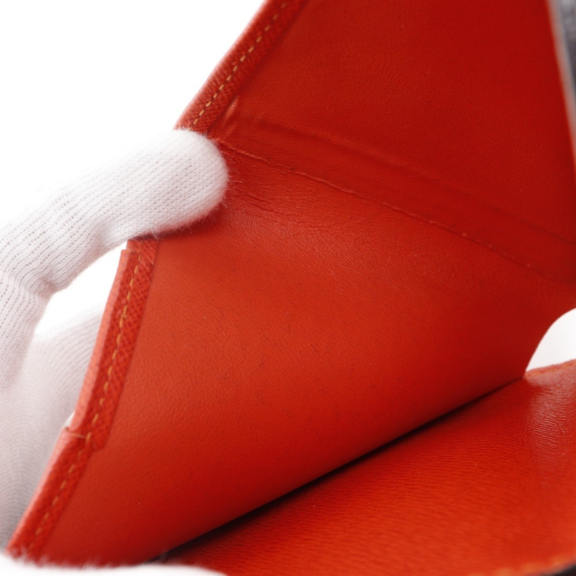 Louis Vuitton Lv Orange Orange Monogram Perforated Wallet