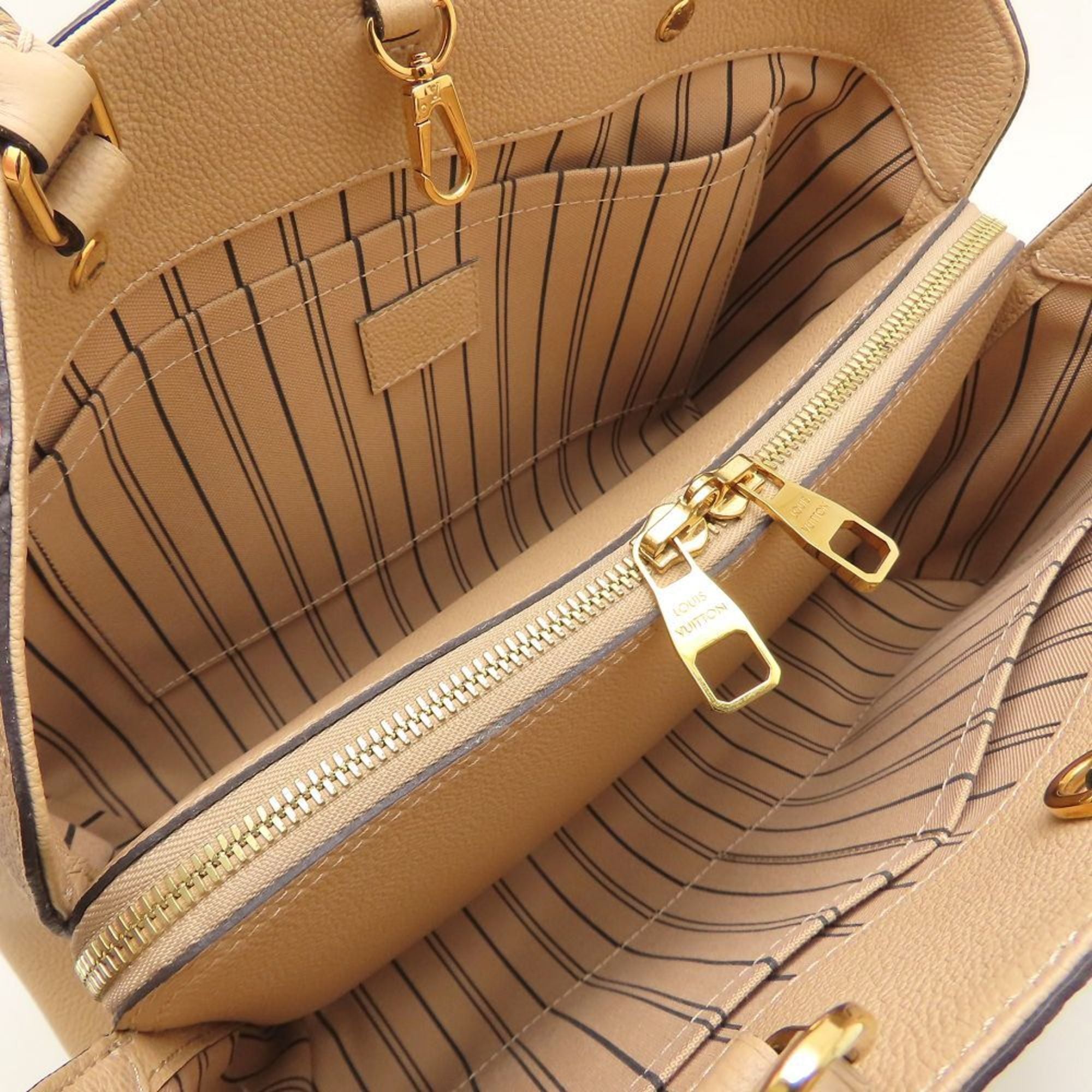 Louis Vuitton Dune Leather Handbag
