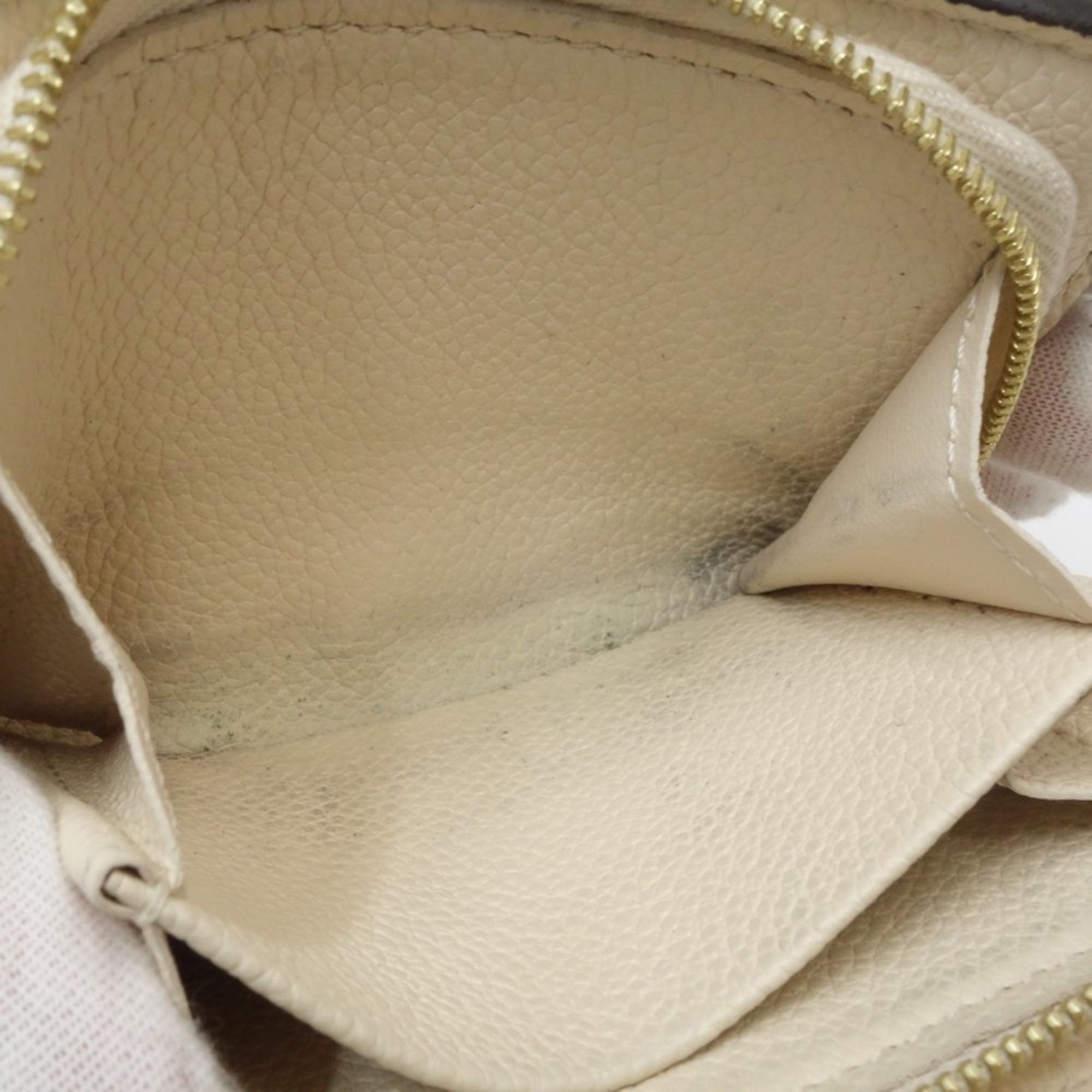 Louis Vuitton Monogram Empreinte Leather Wallet (Tri-Fold)