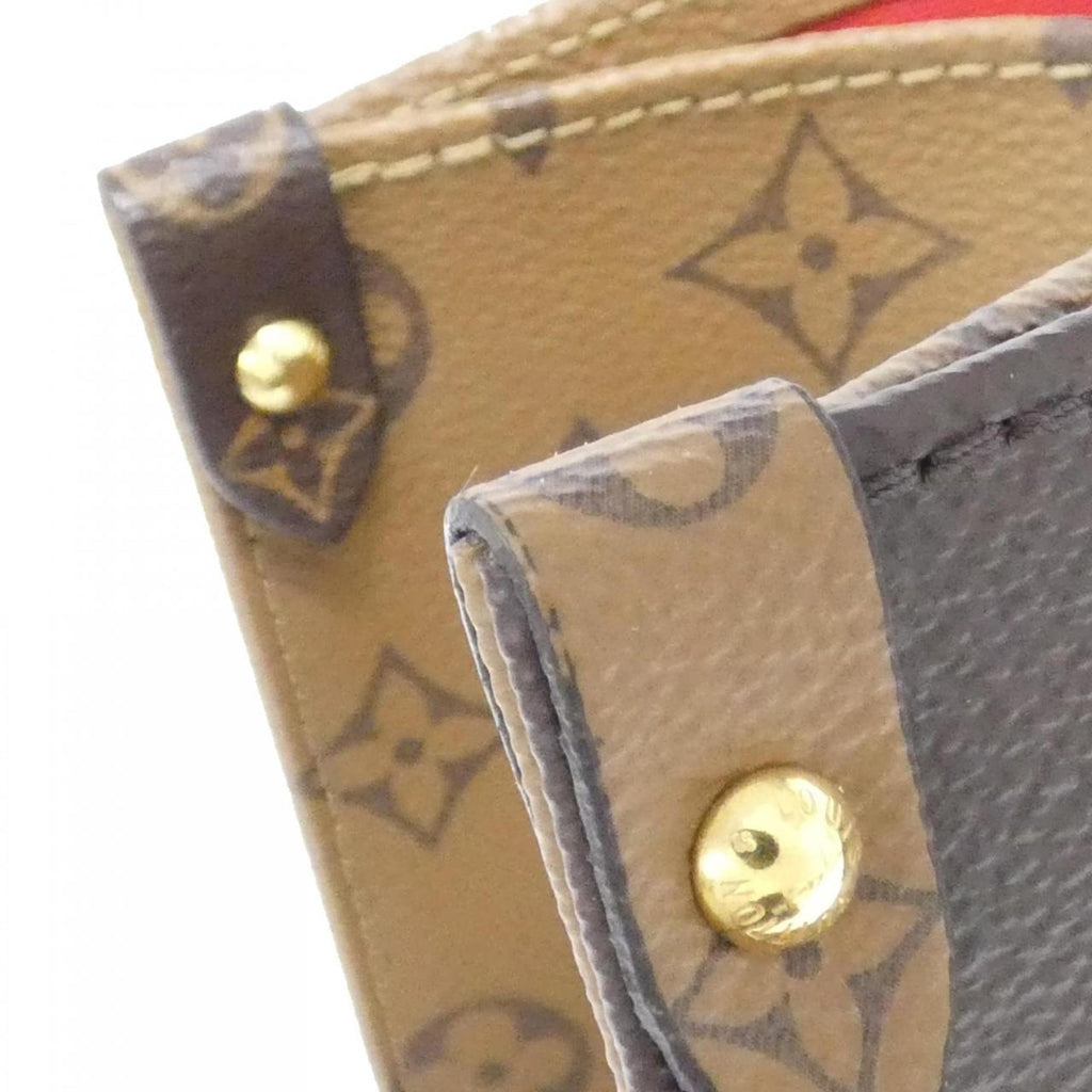Louis Vuitton Marron Coated Canvas Handbag