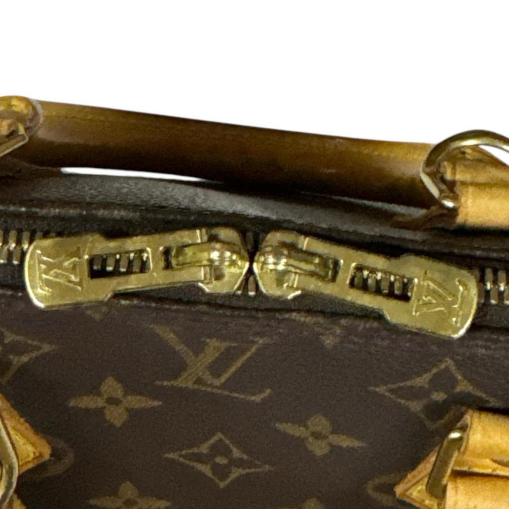Louis Vuitton Brown Monogram Canvas Handbag