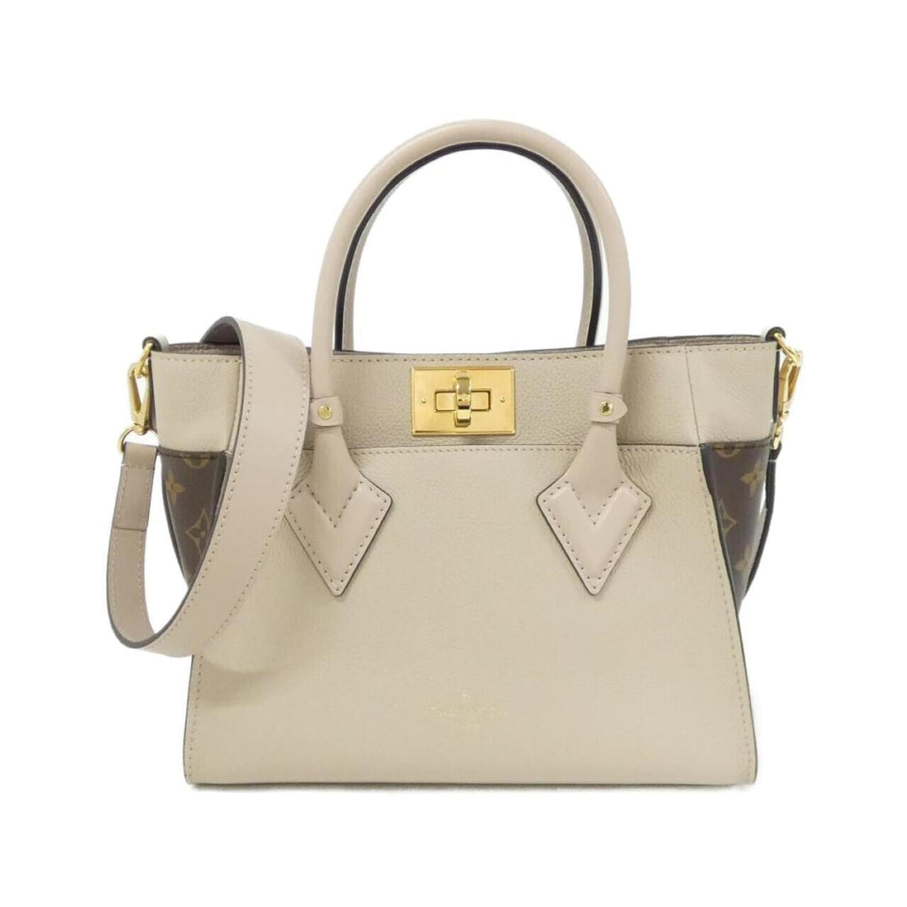 Louis Vuitton Grayish Coated Canvas Leather Handbag