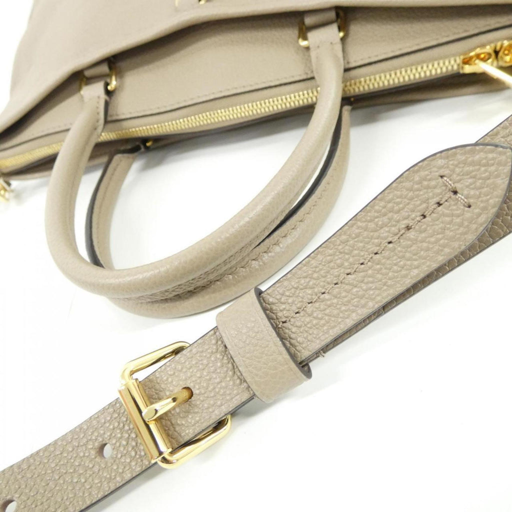 Louis Vuitton Tourterelle Leather Handbag