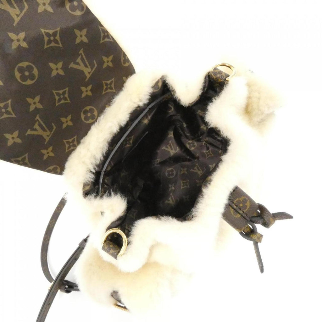 Louis Vuitton Cream Coated Canvas Backpack