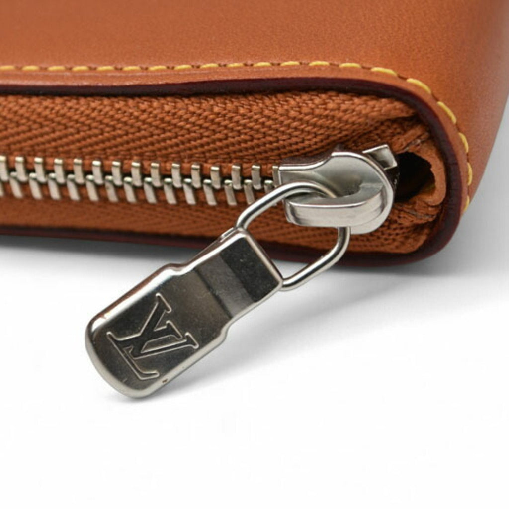 Louis Vuitton Nomad Brown Leather Wallet