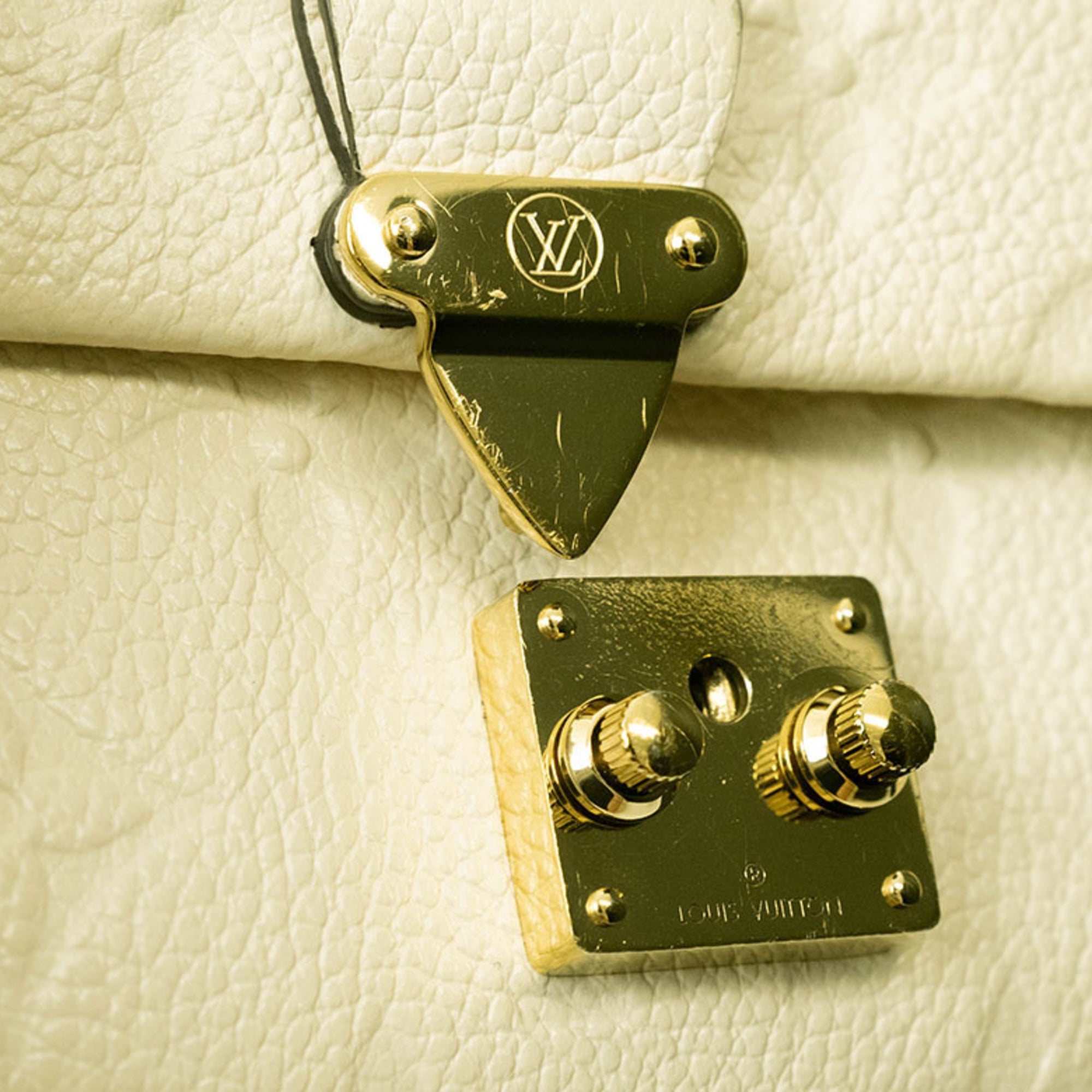 Louis Vuitton Cream Monogram Empreinte Leather Wallet
