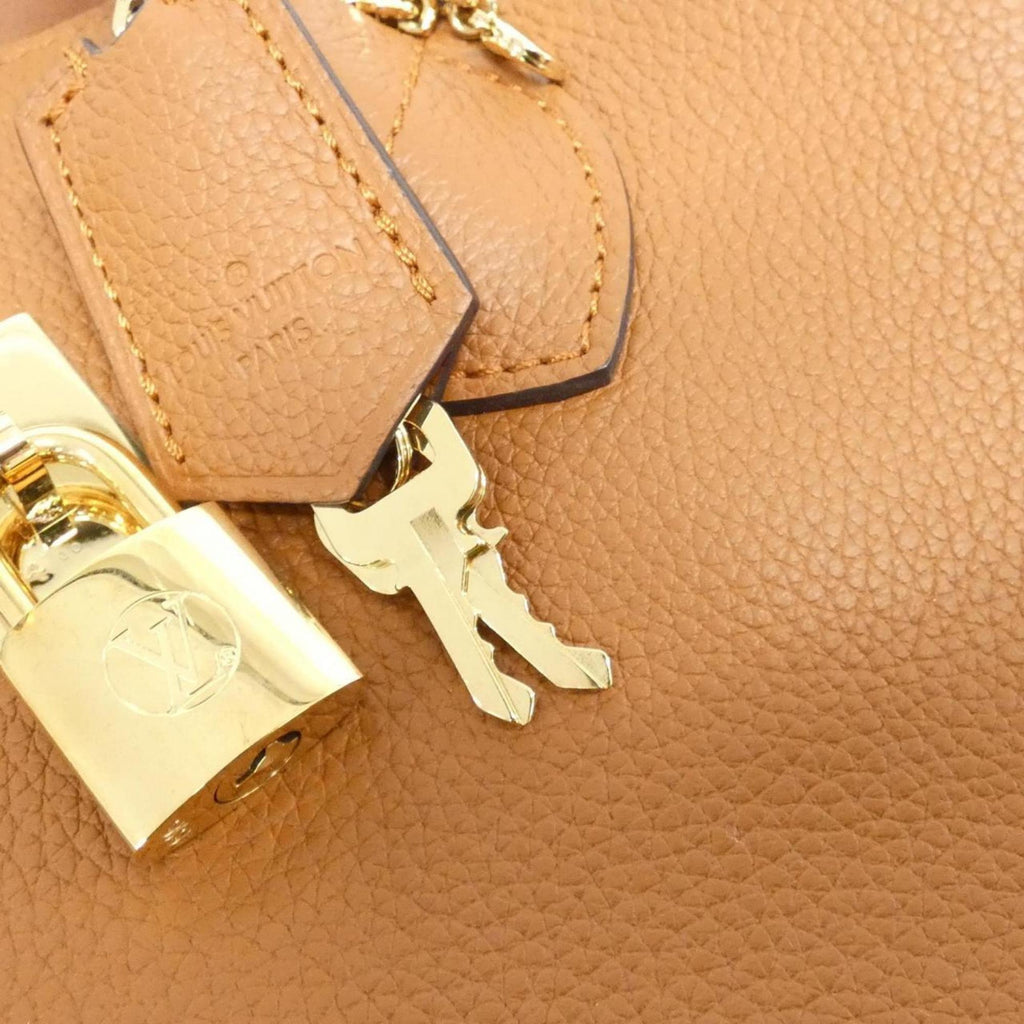 Louis Vuitton Gold Leather Handbag