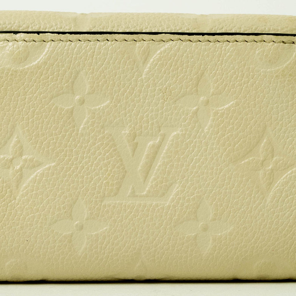 Louis Vuitton Cream Monogram Empreinte Leather Wallet