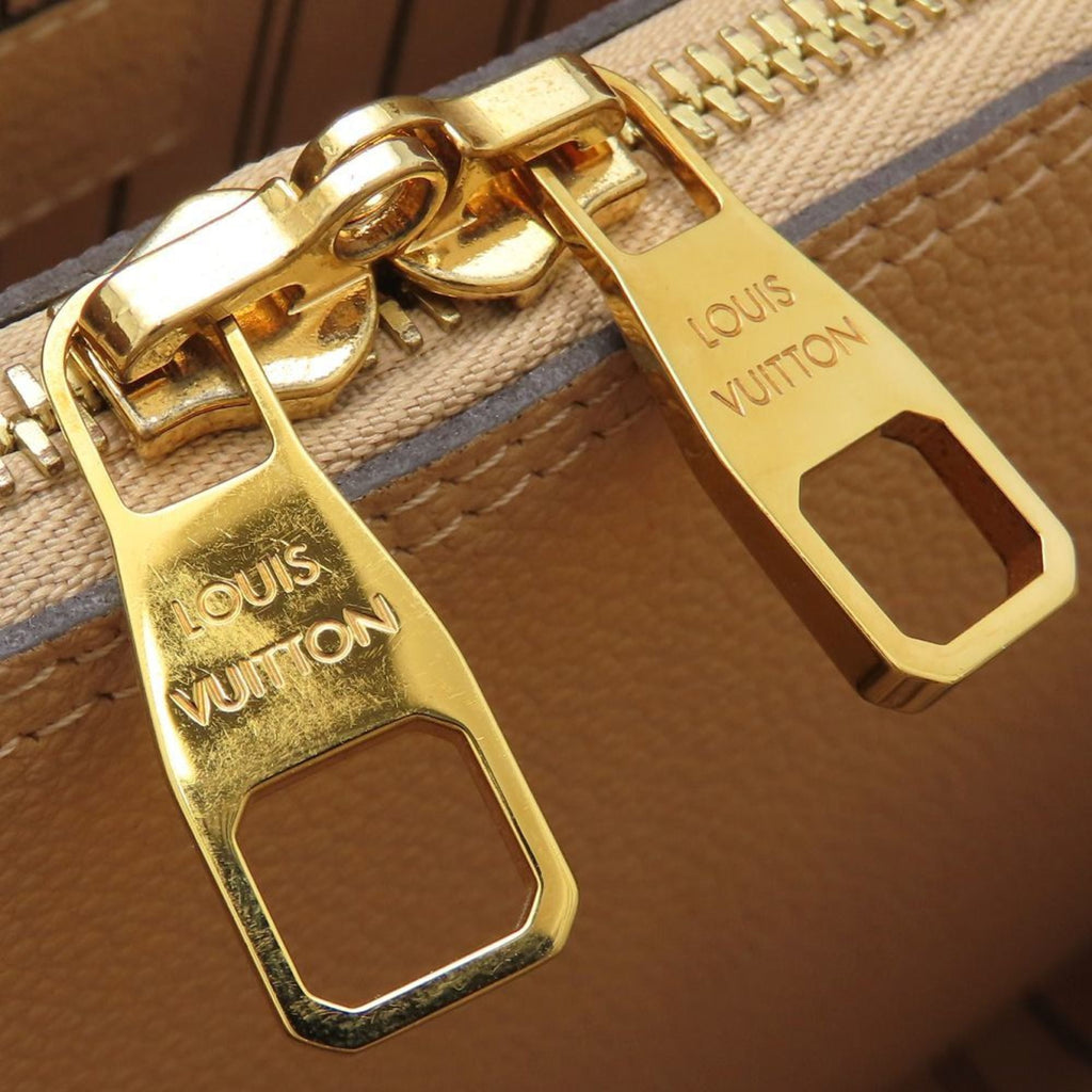 Louis Vuitton Dune Leather Handbag
