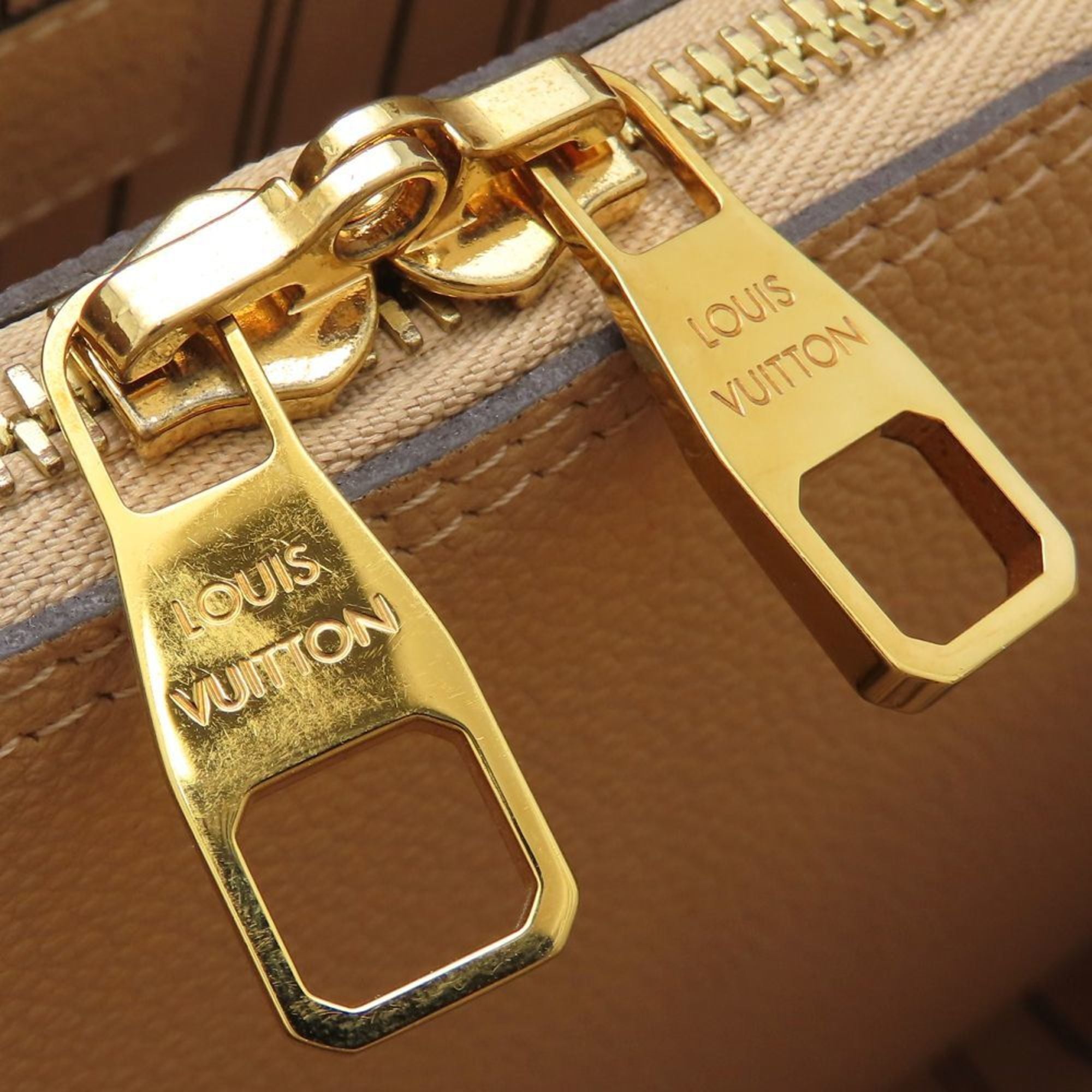 Louis Vuitton Dune Leather Handbag