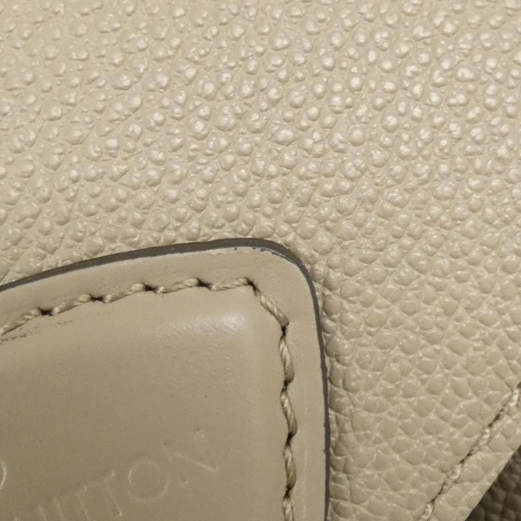 Louis Vuitton Monogram Empreinte Tourterelle Leather Backpack