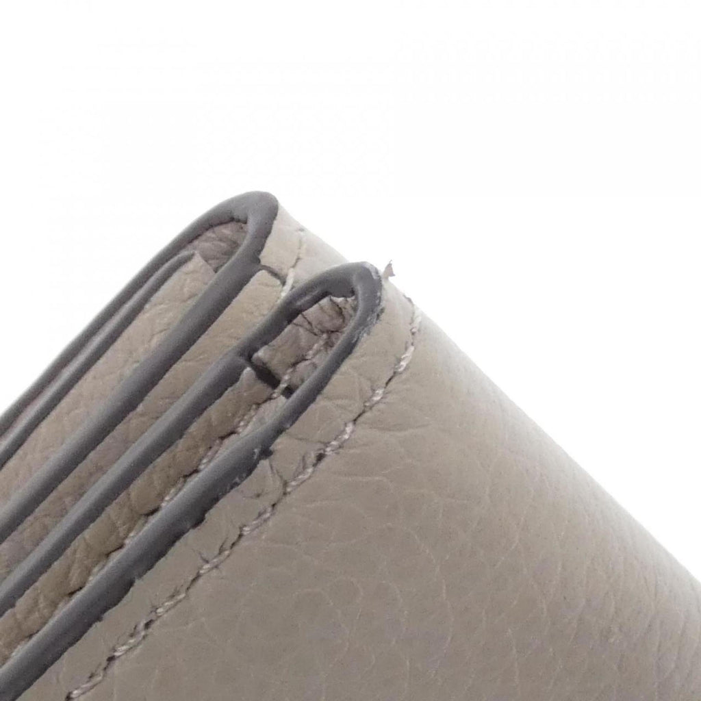 Louis Vuitton Grayish Leather Wallet (Tri-Fold)
