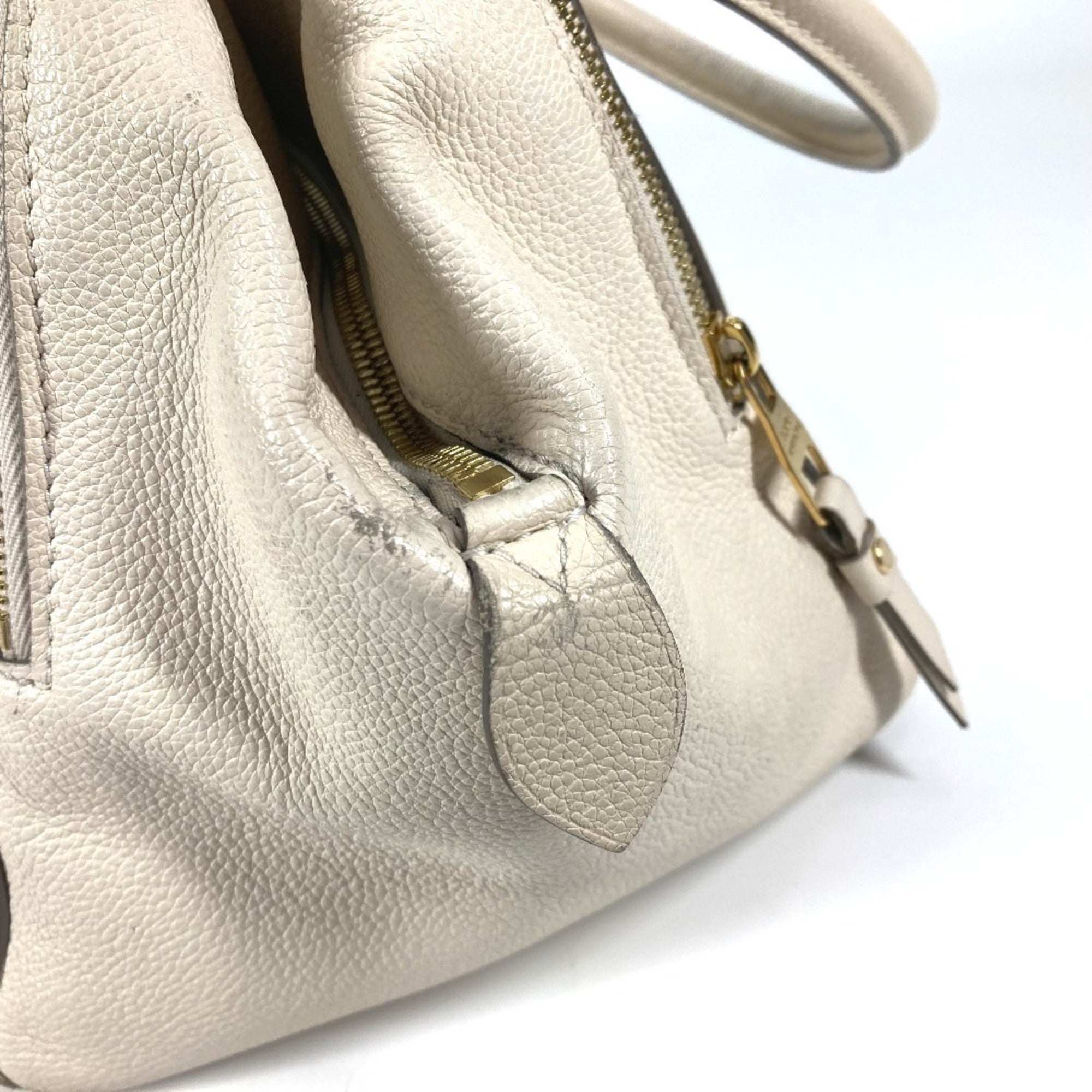 Louis Vuitton Monogram Empreinte Neige White Monogram Empreinte Handbag Tote Bag