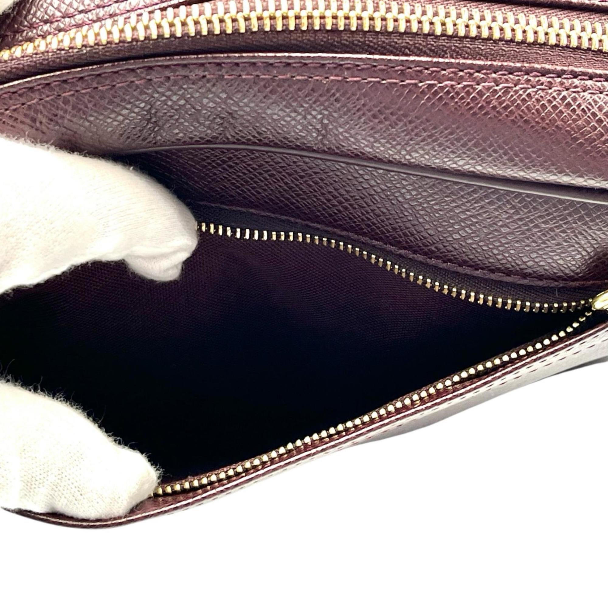 Louis Vuitton Brown Leather Clutch Bag