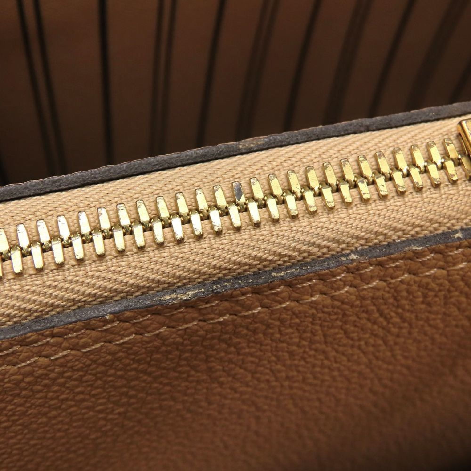 Louis Vuitton Dune Leather Handbag