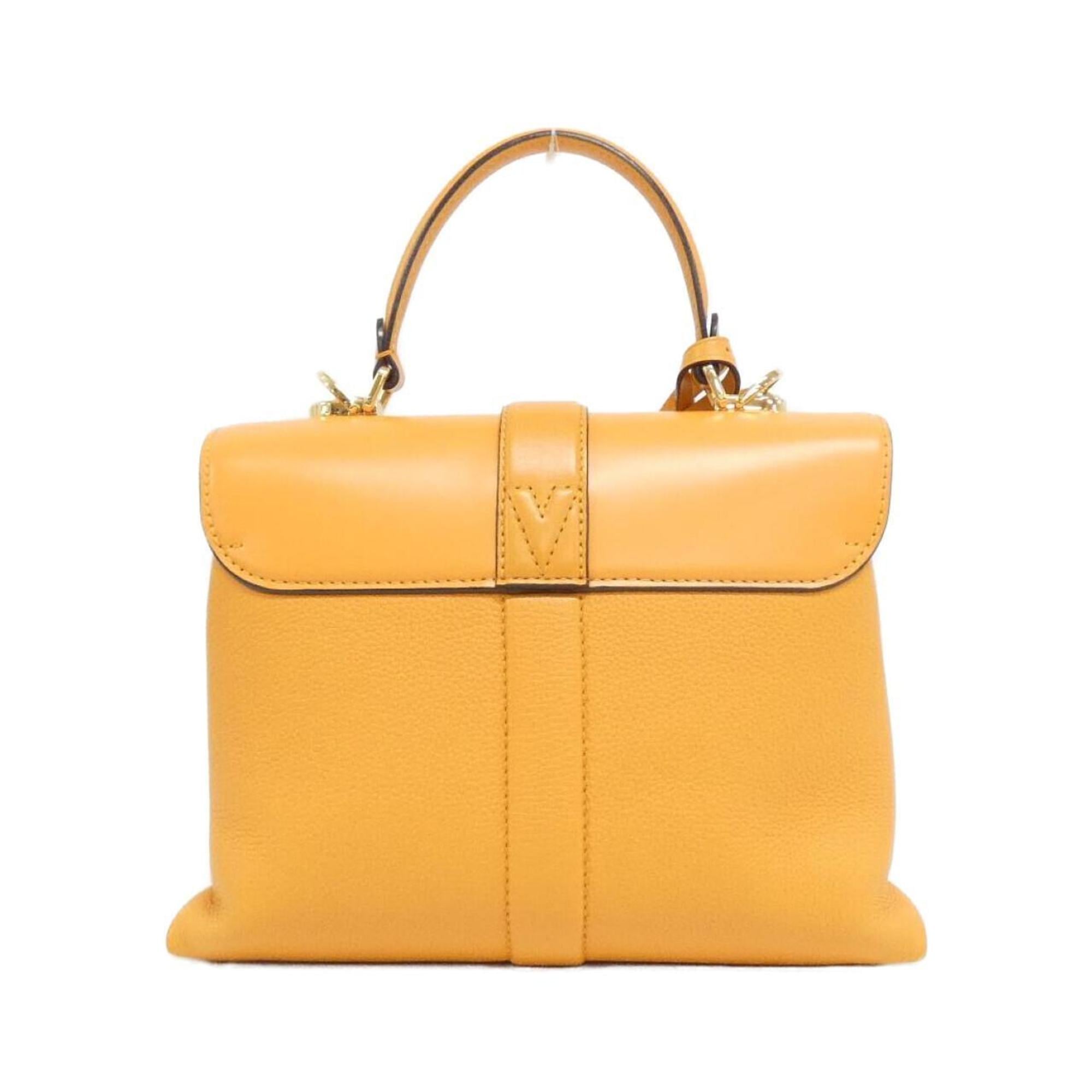 Louis Vuitton Gold Leather Handbag