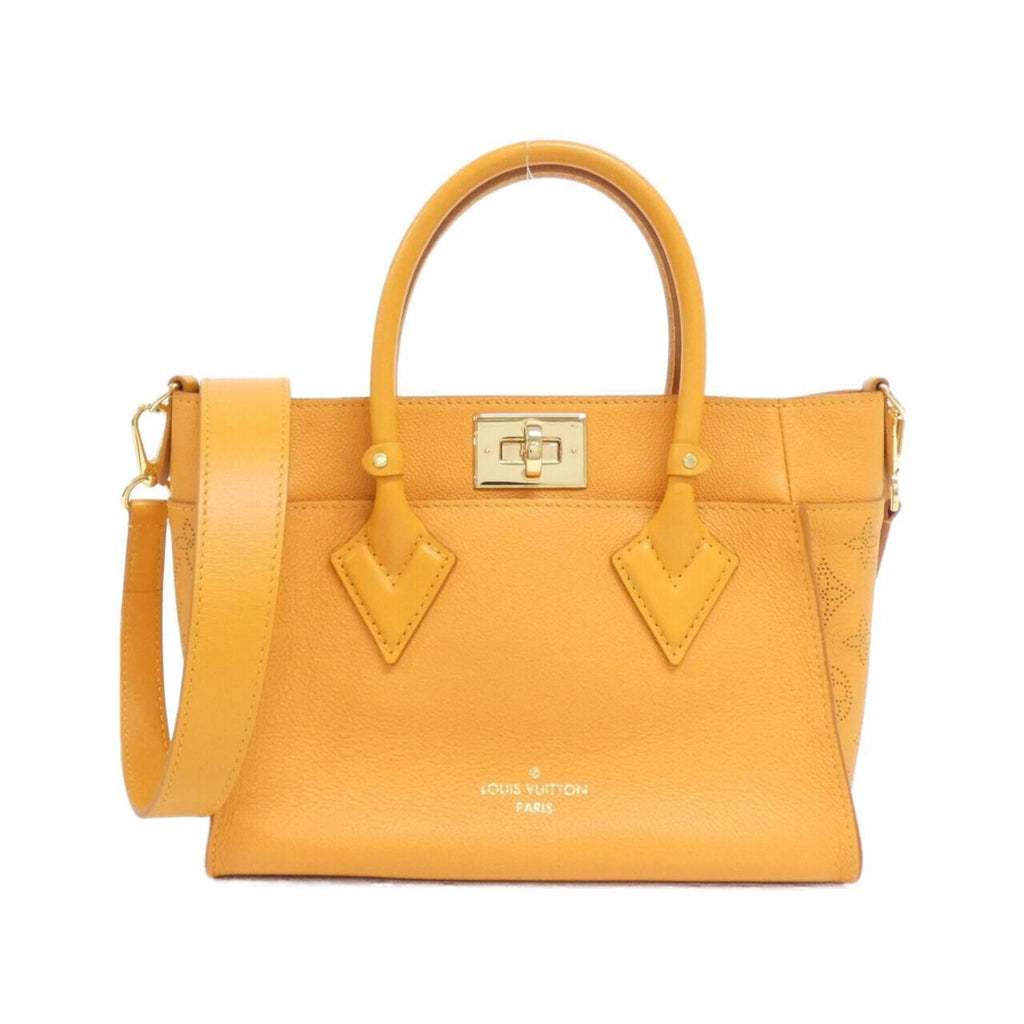 Louis Vuitton Gold Leather Handbag