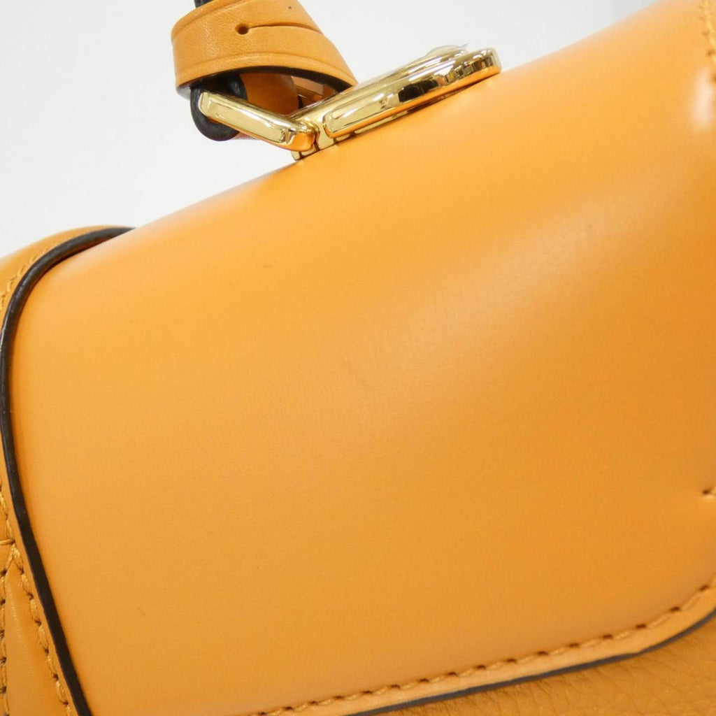Louis Vuitton Gold Leather Handbag