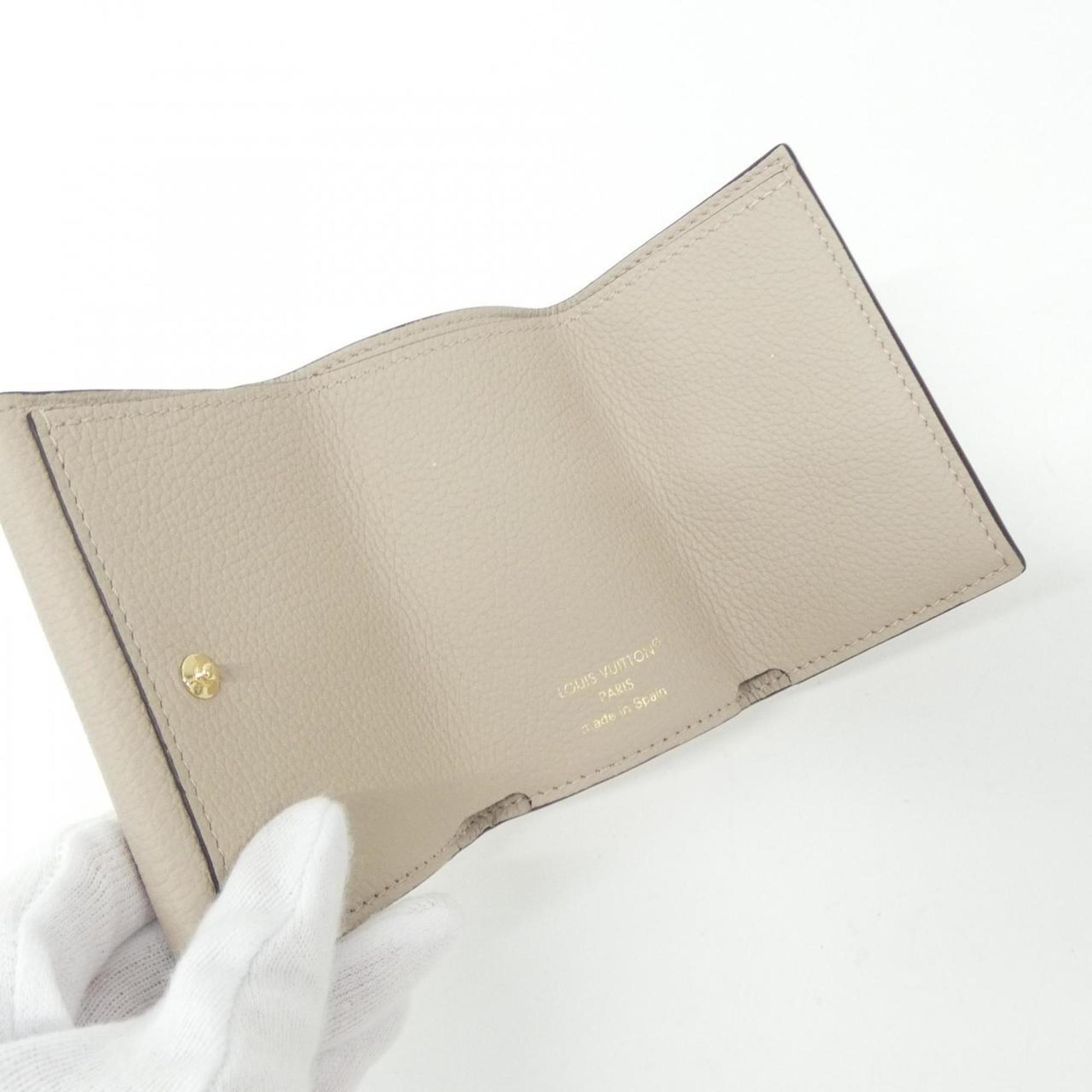 Louis Vuitton Grayish Leather Wallet (Tri-Fold)