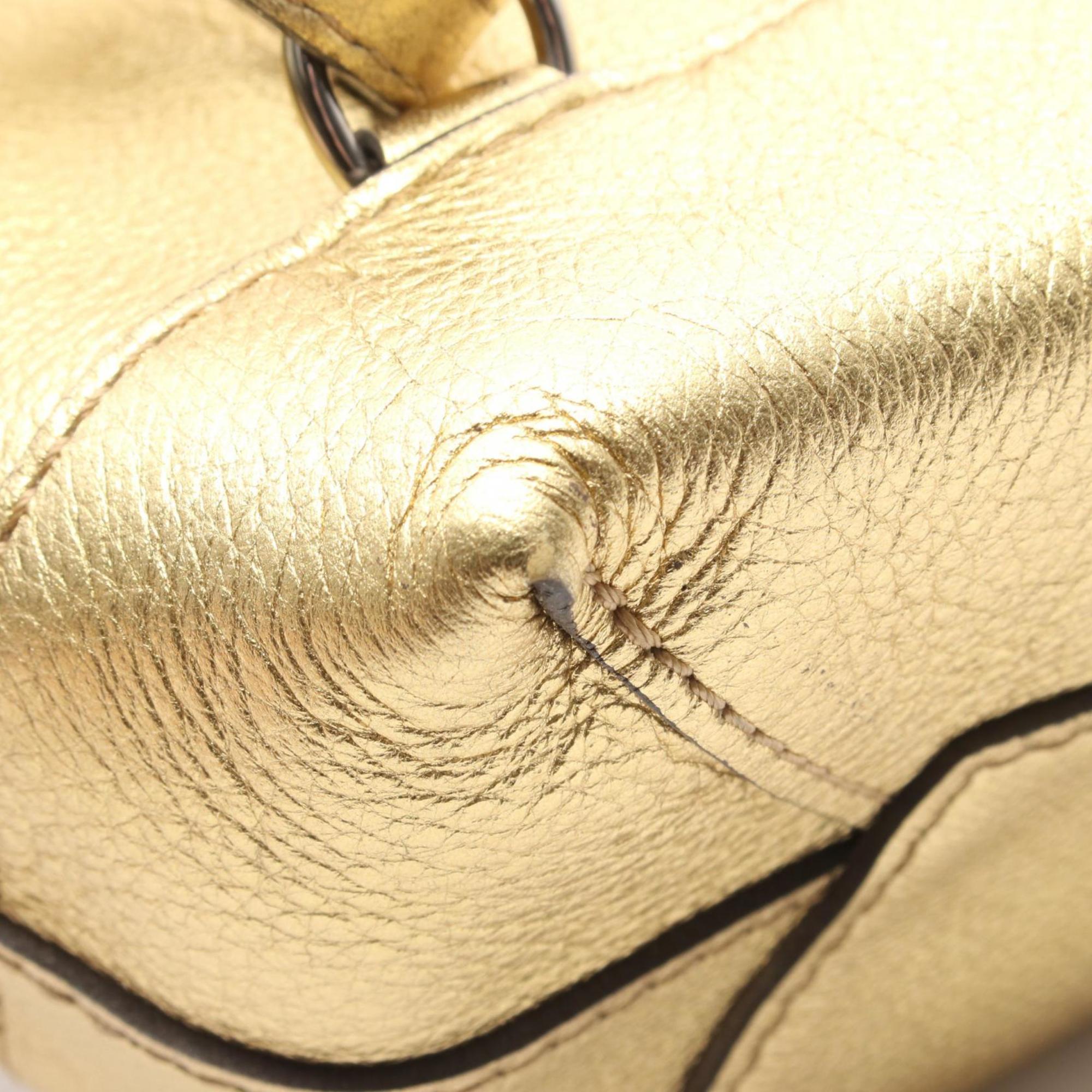 Louis Vuitton Gold Leather Backpack