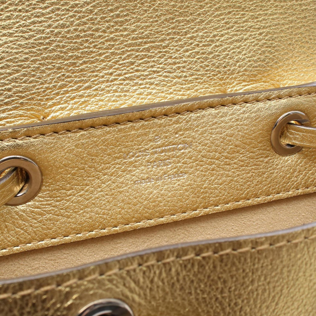 Louis Vuitton Gold Leather Backpack