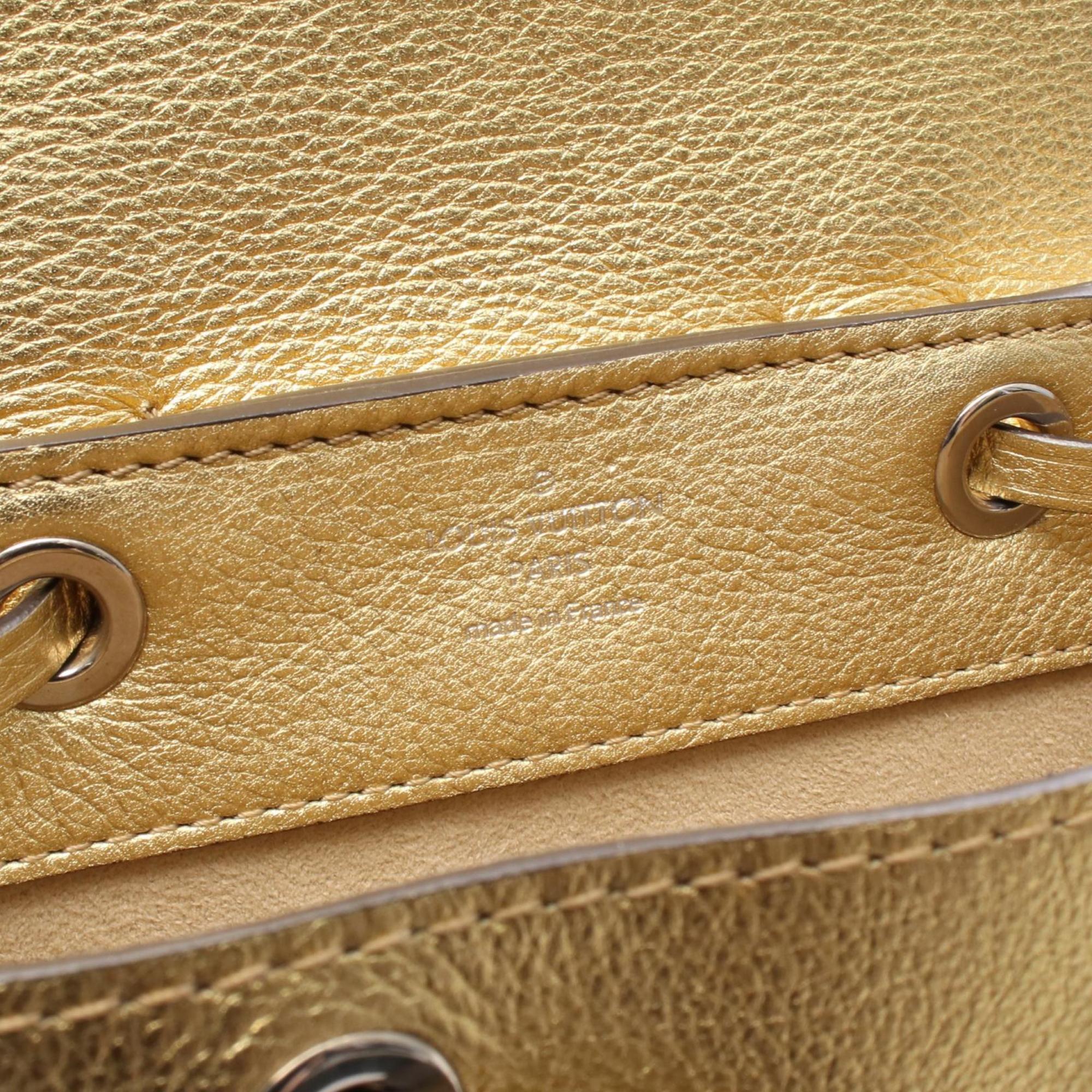 Louis Vuitton Gold Leather Backpack