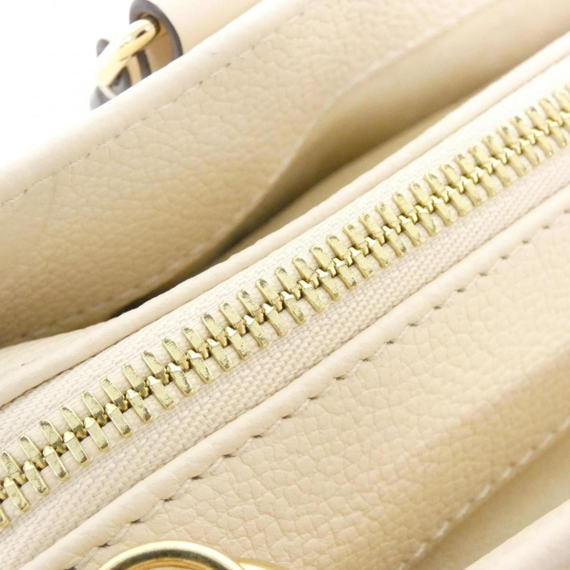 Louis Vuitton Monogram Empreinte Gold Leather Handbag