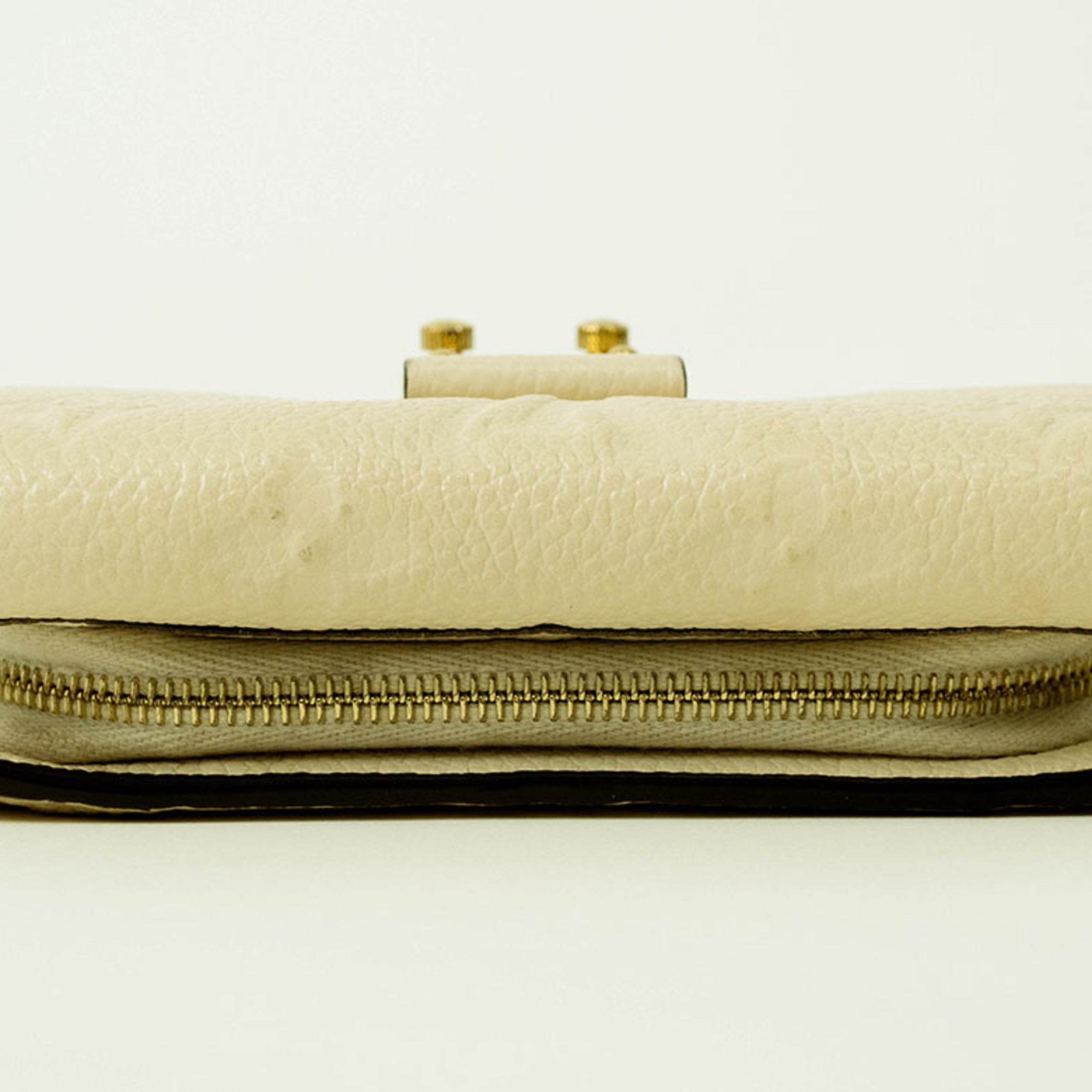 Louis Vuitton Cream Monogram Empreinte Leather Wallet