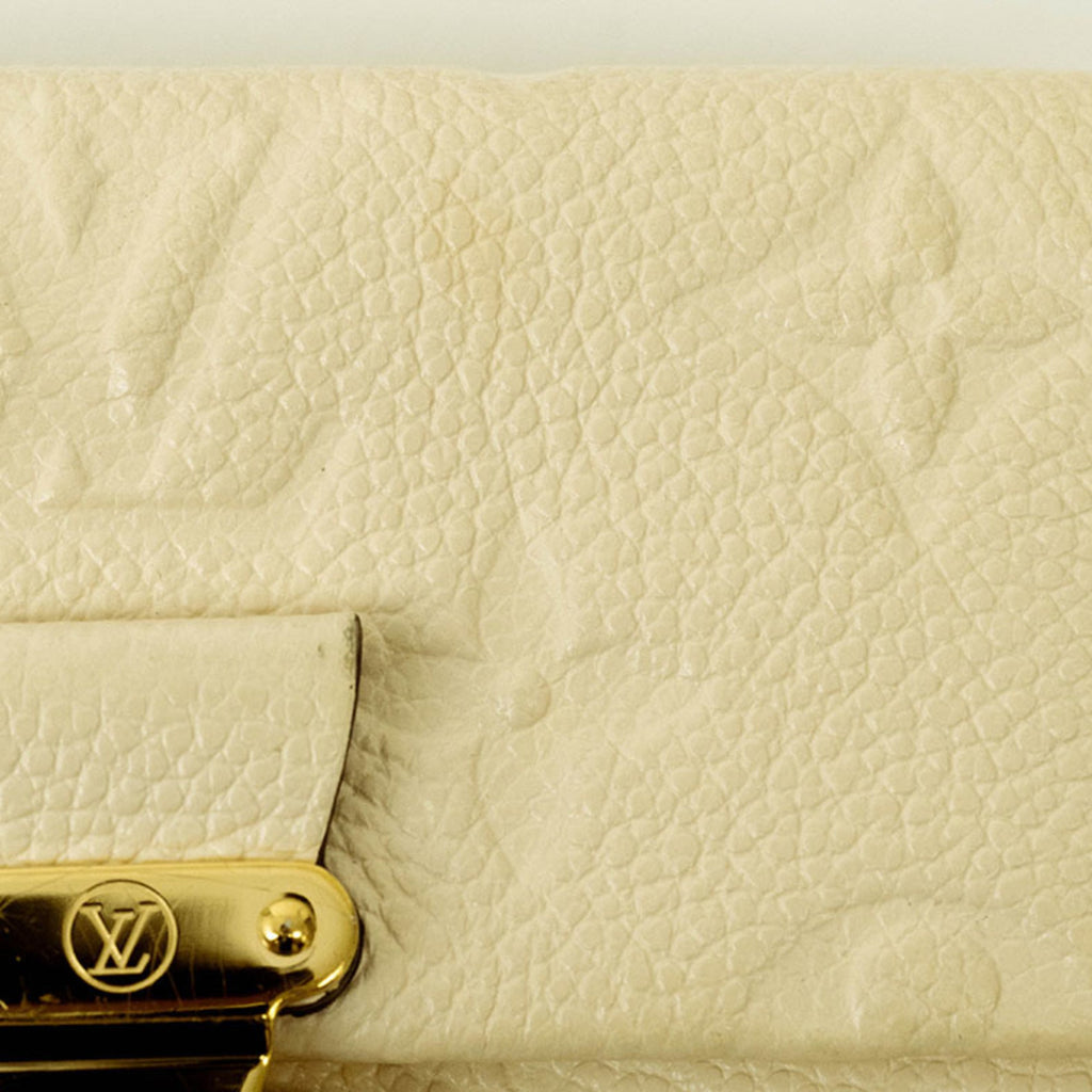 Louis Vuitton Cream Monogram Empreinte Leather Wallet