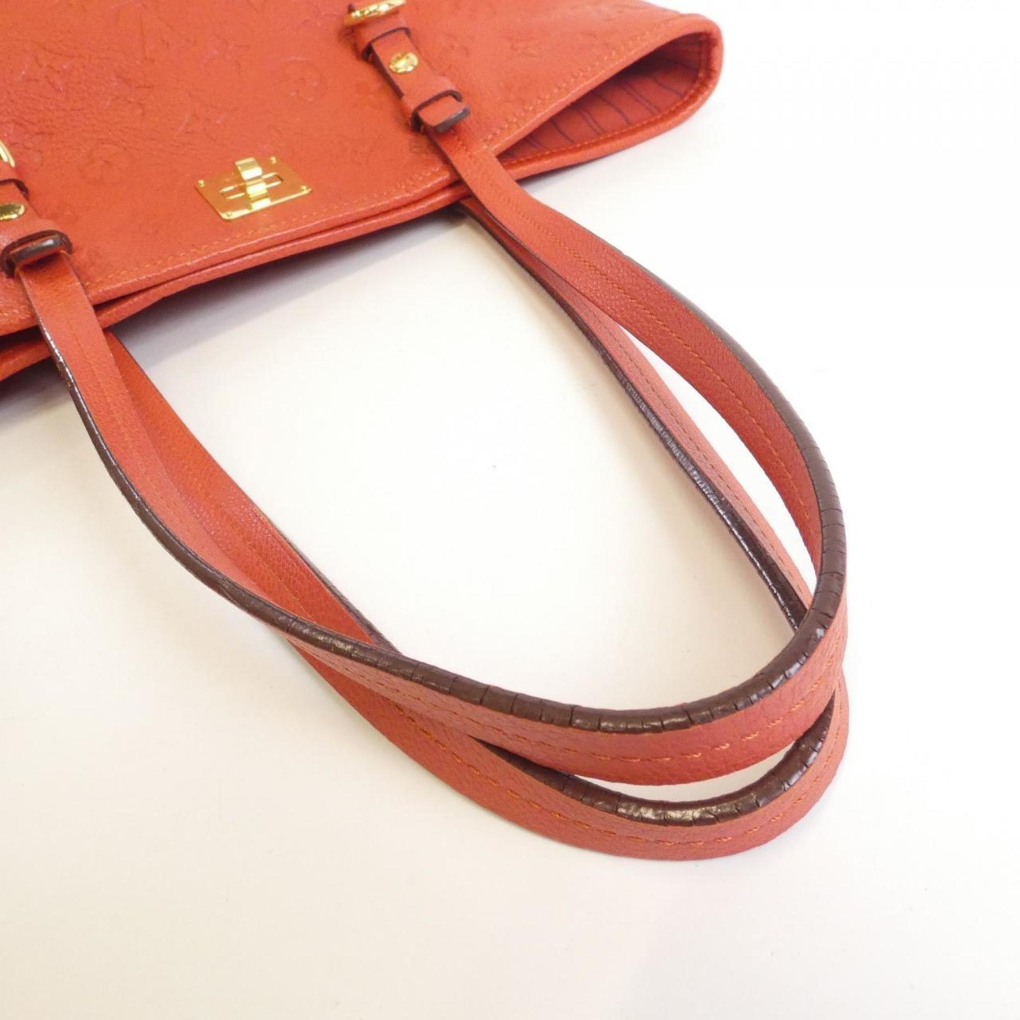 Louis Vuitton Monogram Empreinte Gold Leather Handbag