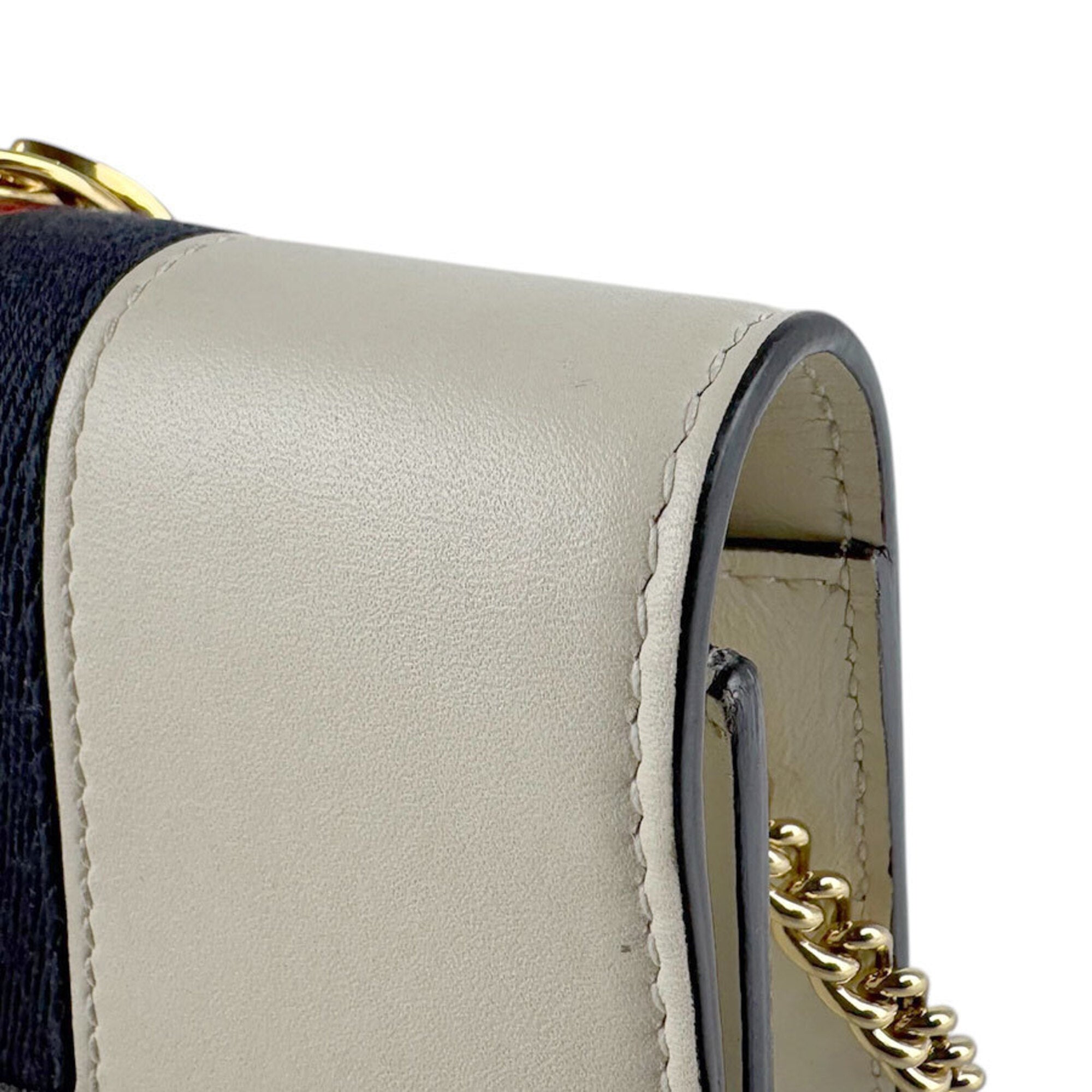 Gucci Gold Ivory Leather Metal Shoulder Bag (Pre-Owned)