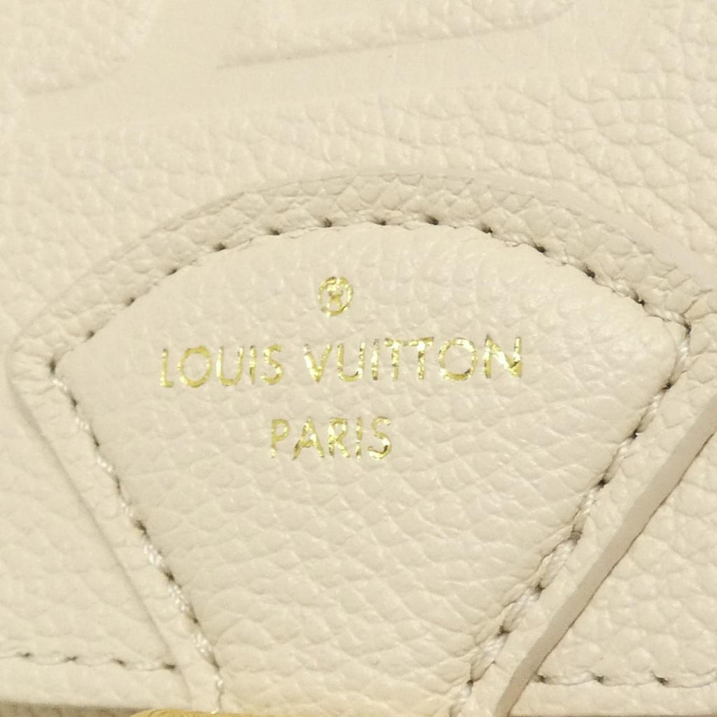 Louis Vuitton Monogram Empreinte Gold Leather Backpack