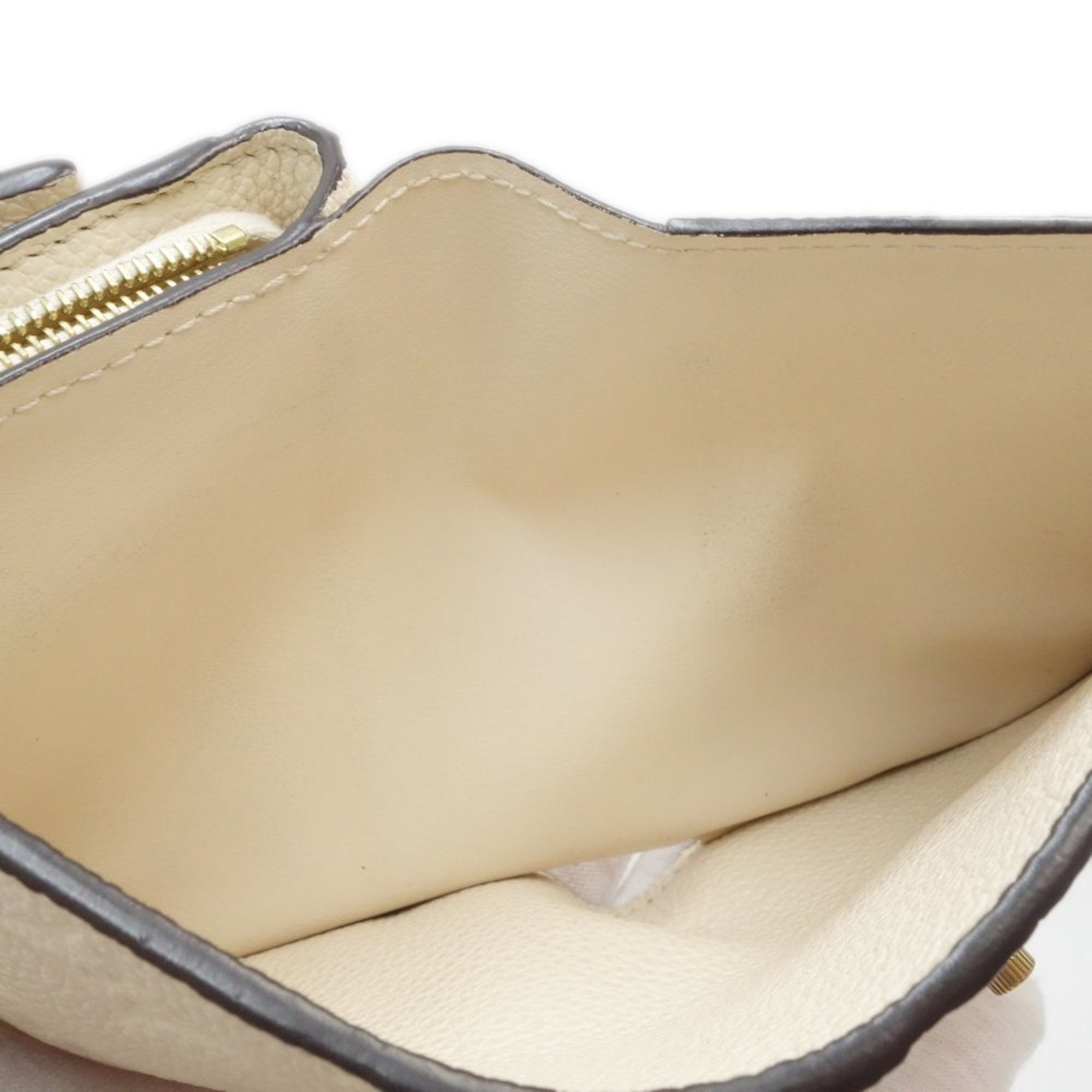 Louis Vuitton Monogram Empreinte Leather Wallet (Tri-Fold)