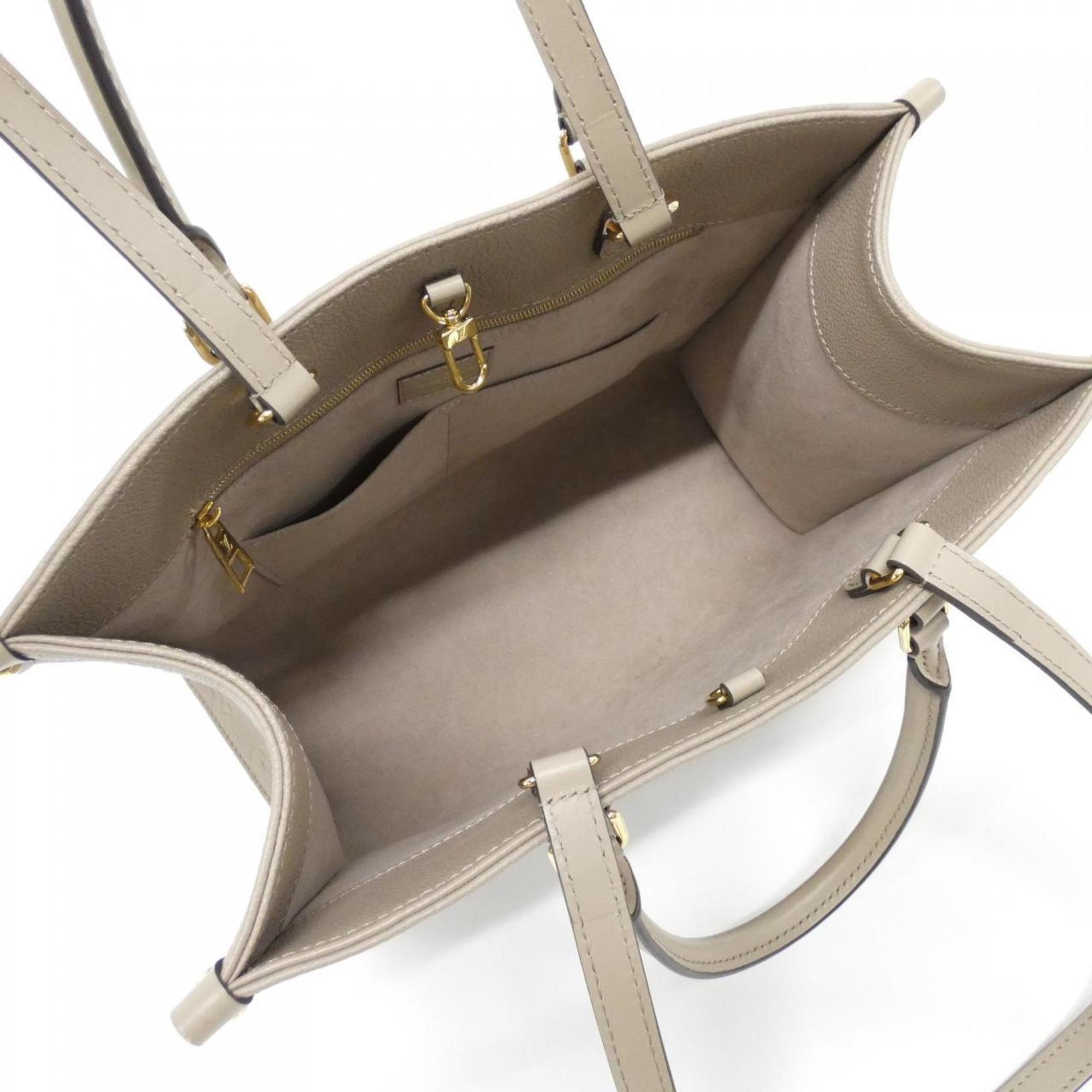 Louis Vuitton Tourterelle Leather Handbag