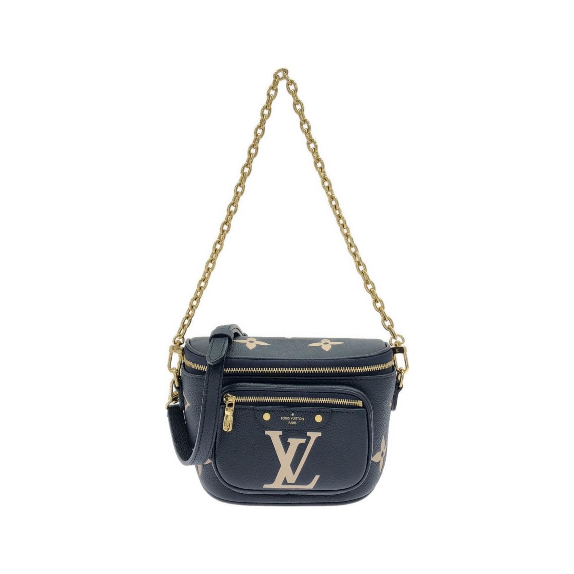Louis Vuitton Cream Navy Leather Handbag